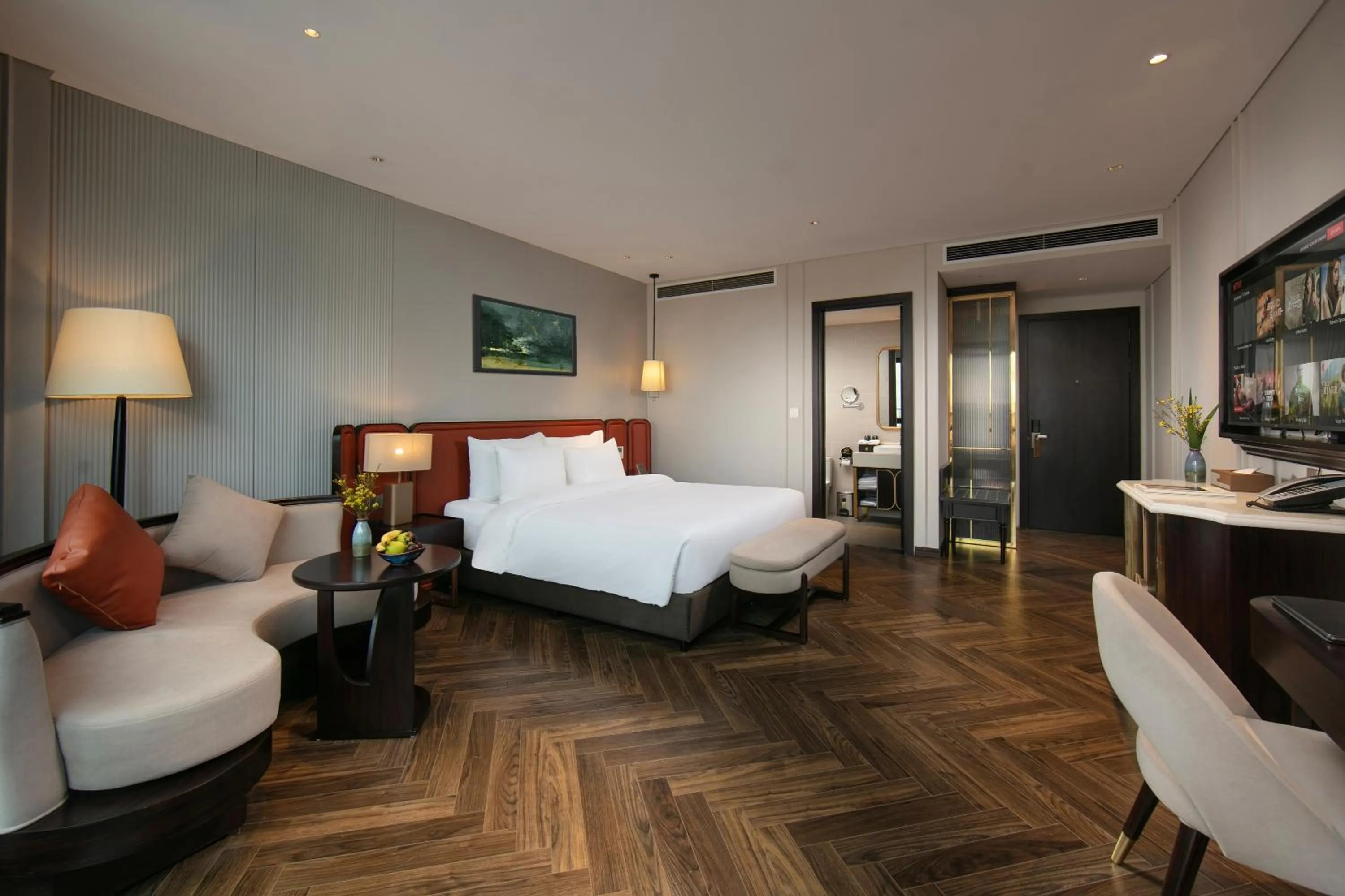 Bed in Le Premier Hotel & Rooftop Bar