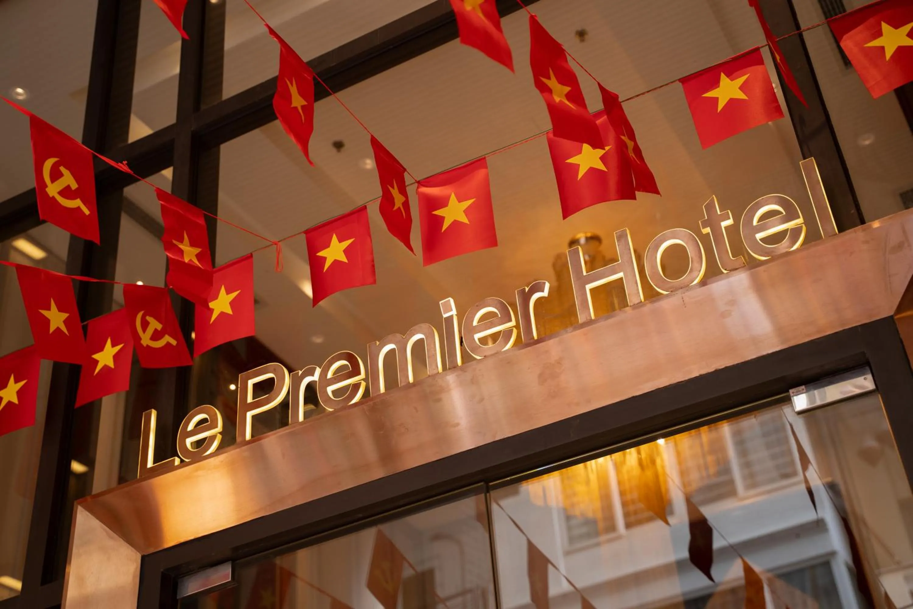 Property logo or sign in Le Premier Hotel & Rooftop Bar