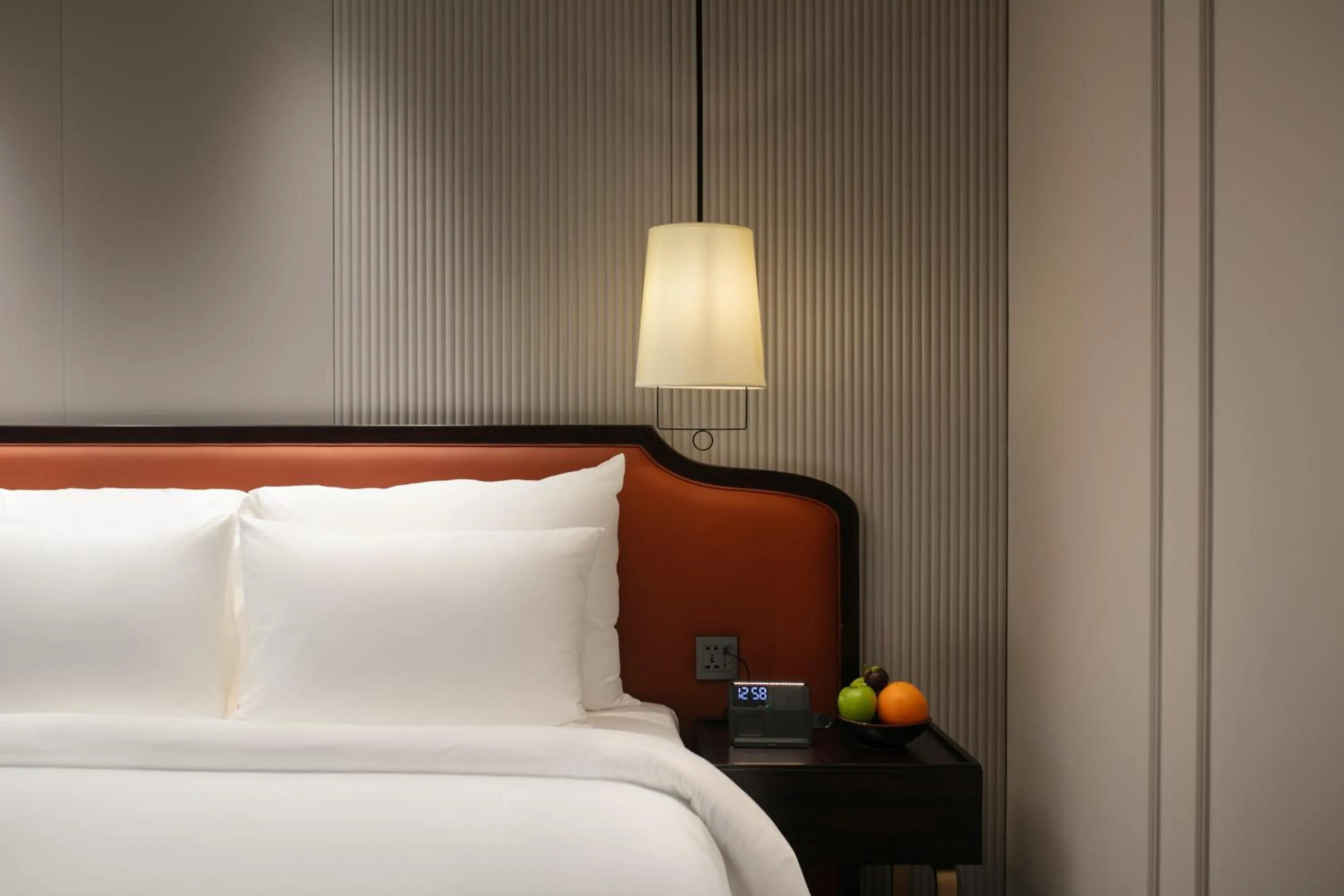 Bed in Le Premier Hotel & Rooftop Bar