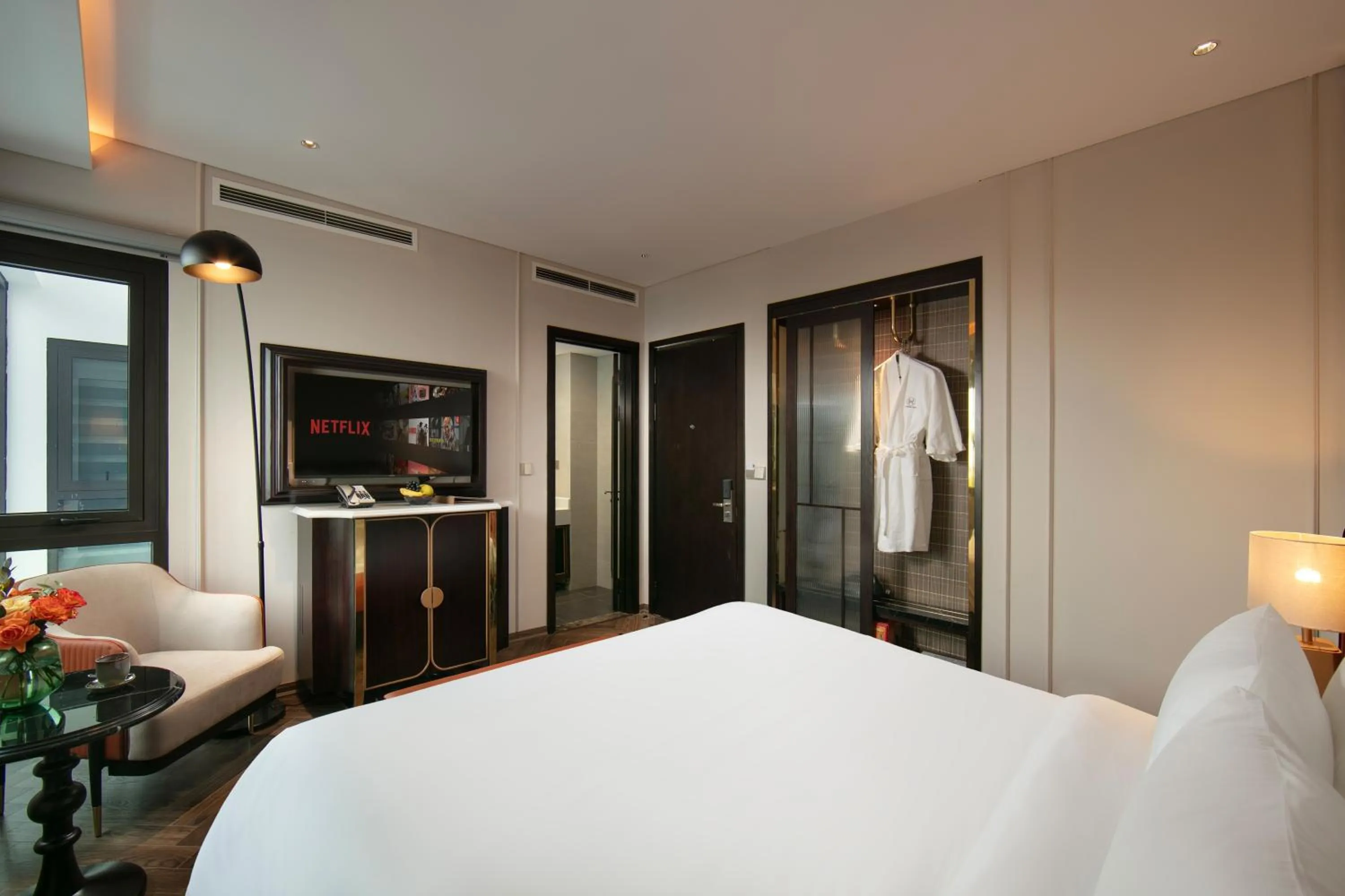 Bed in Le Premier Hotel & Rooftop Bar