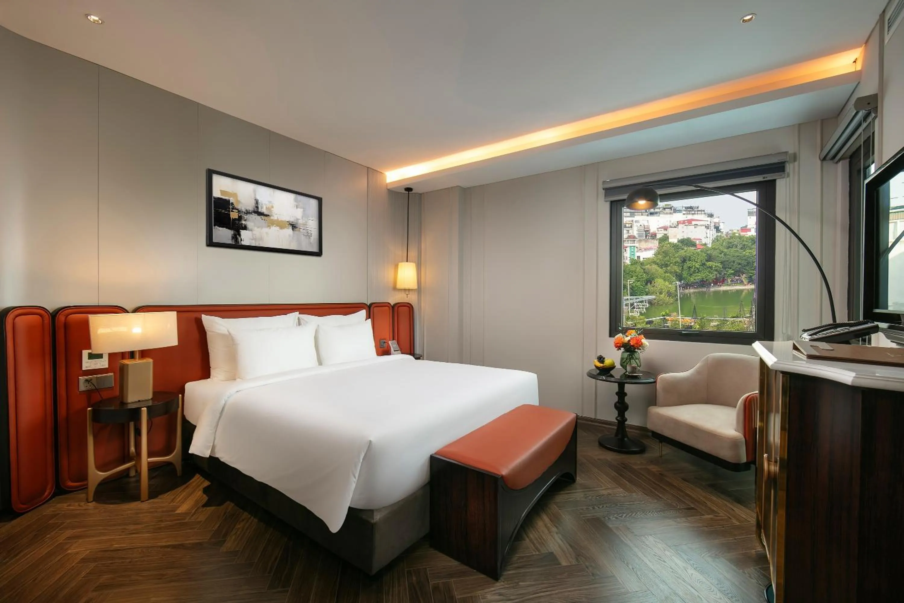 Bed in Le Premier Hotel & Rooftop Bar