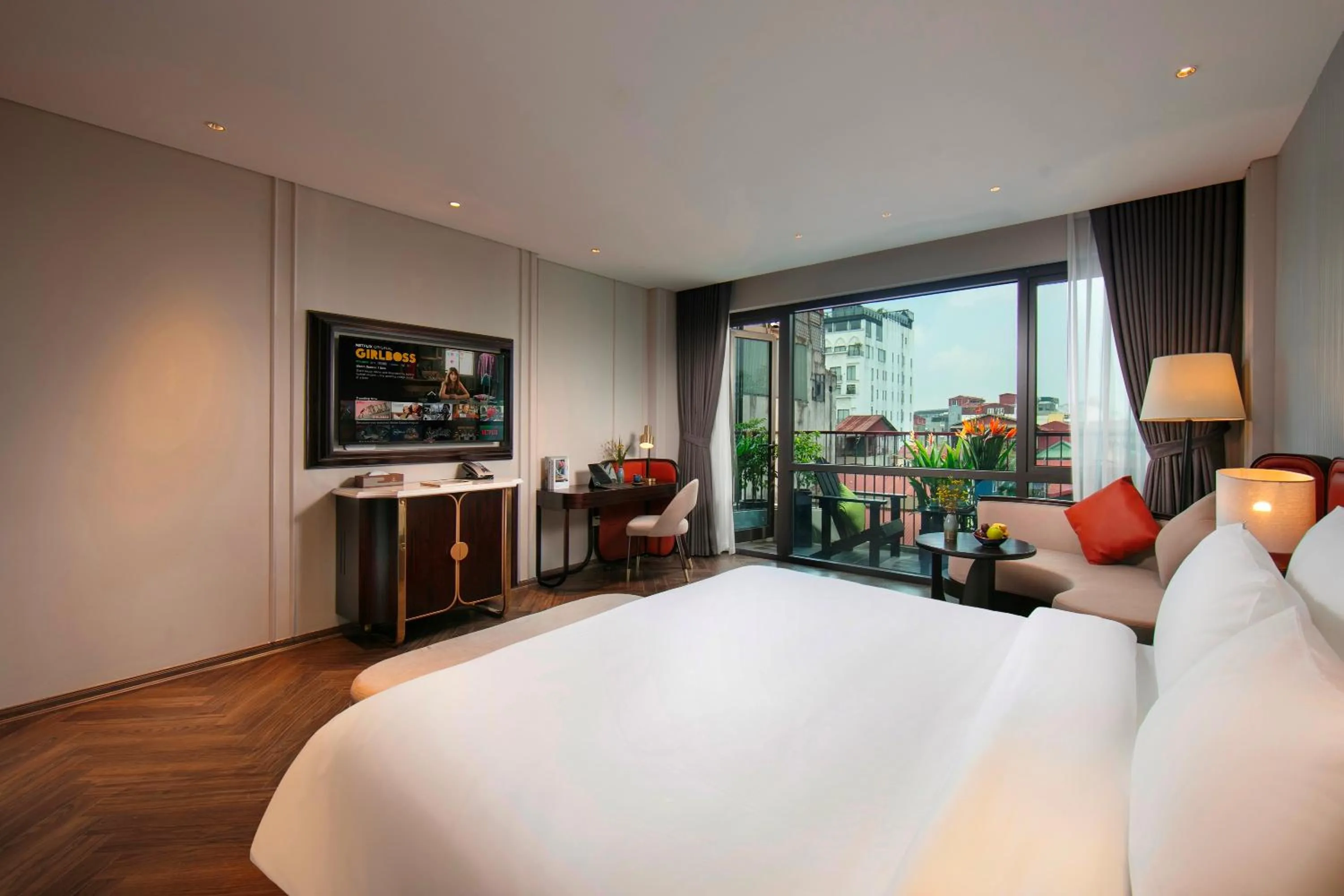 Bed in Le Premier Hotel & Rooftop Bar
