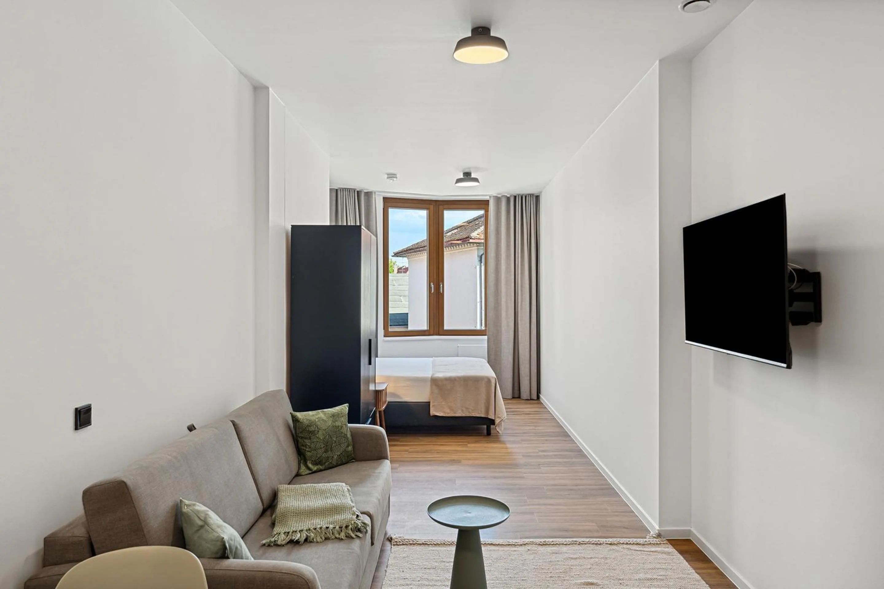 Bed in Limehome Memmingen Maximilianstraße