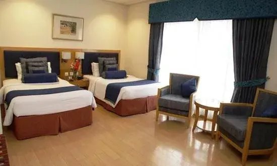 Deluxe Twin Room in Park Lane Hotel Deluxe Twin Room in Park Lane Hotel