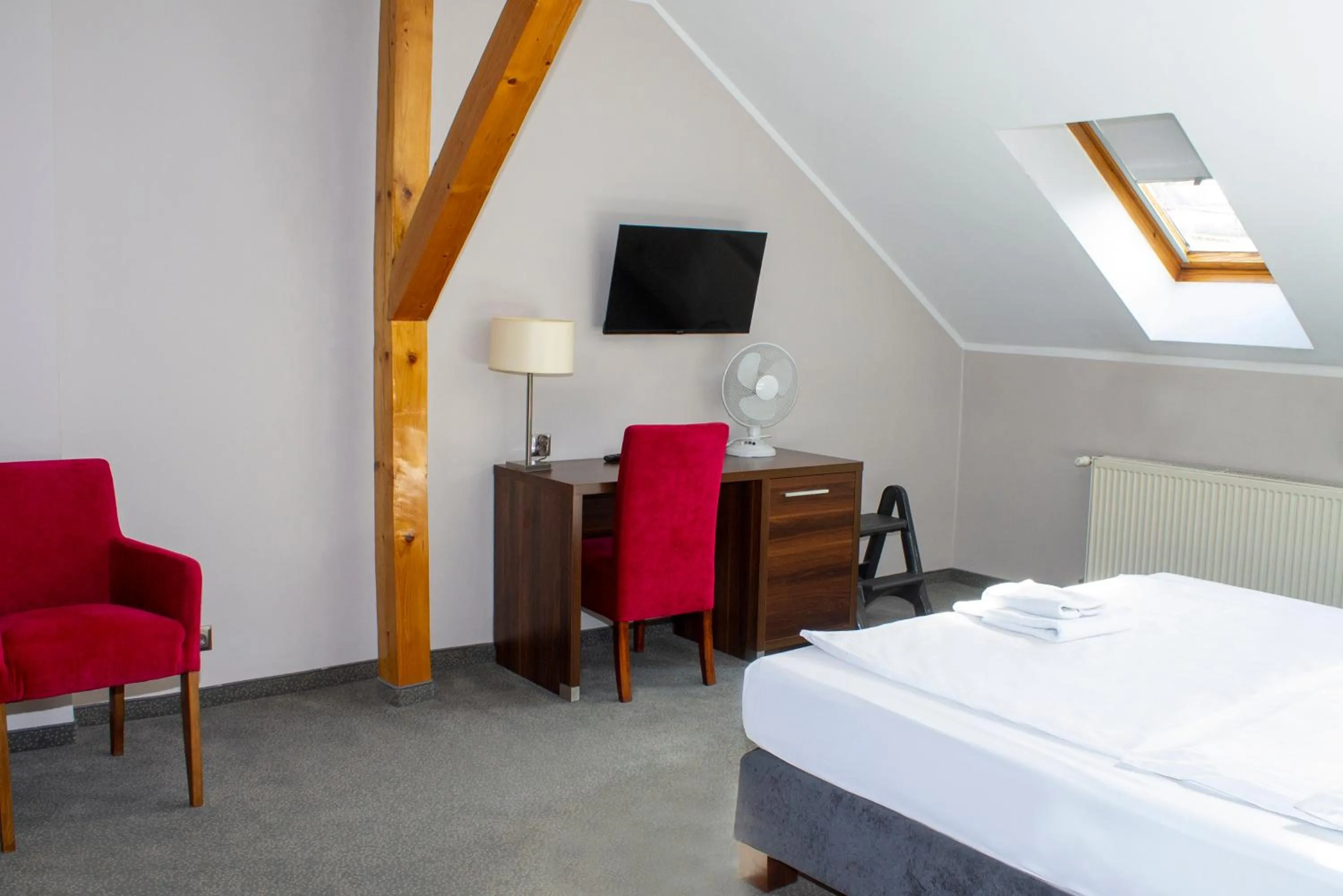 Bed in Hotel Kamieniczka