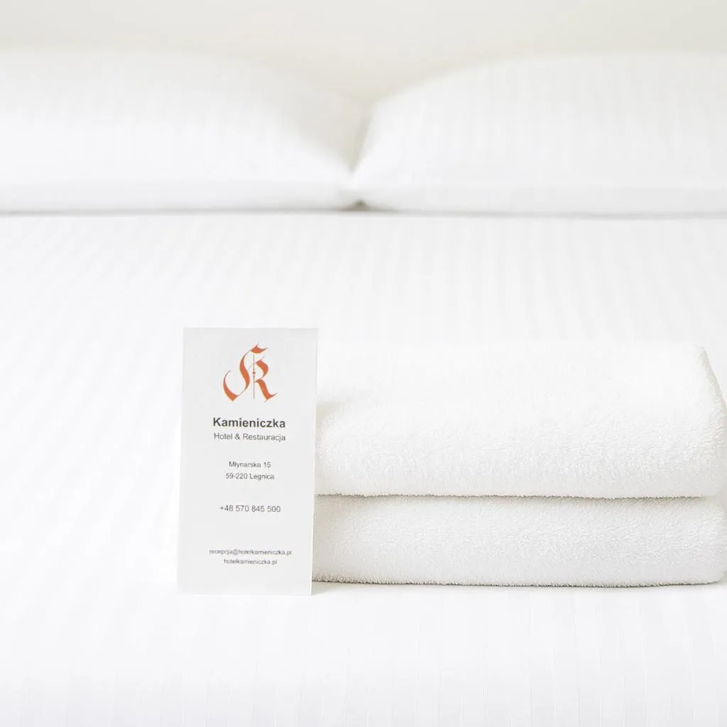 Bed in Hotel Kamieniczka