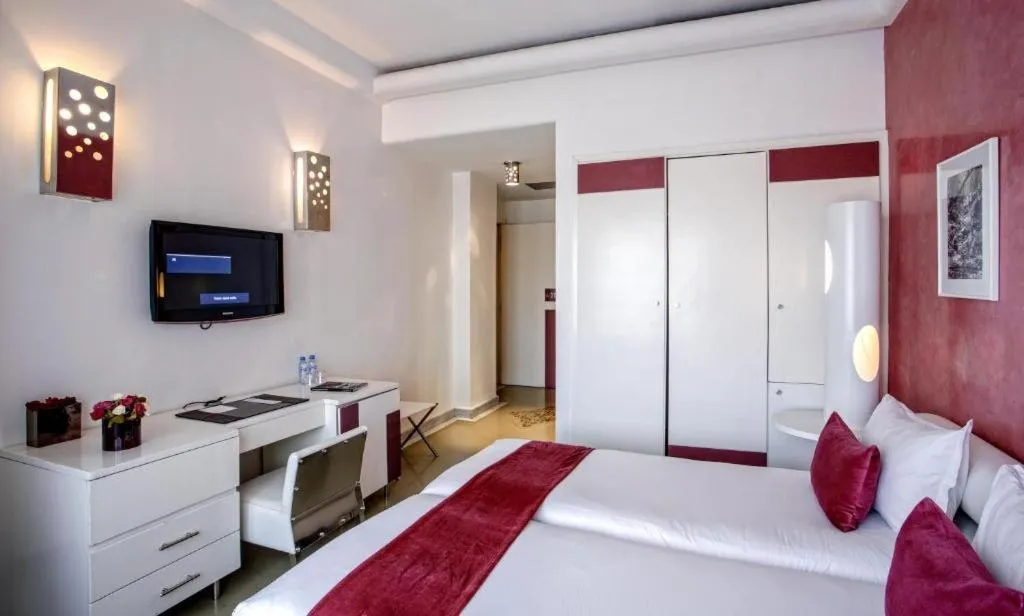 Bed in La Renaissance hôtel Marrakech