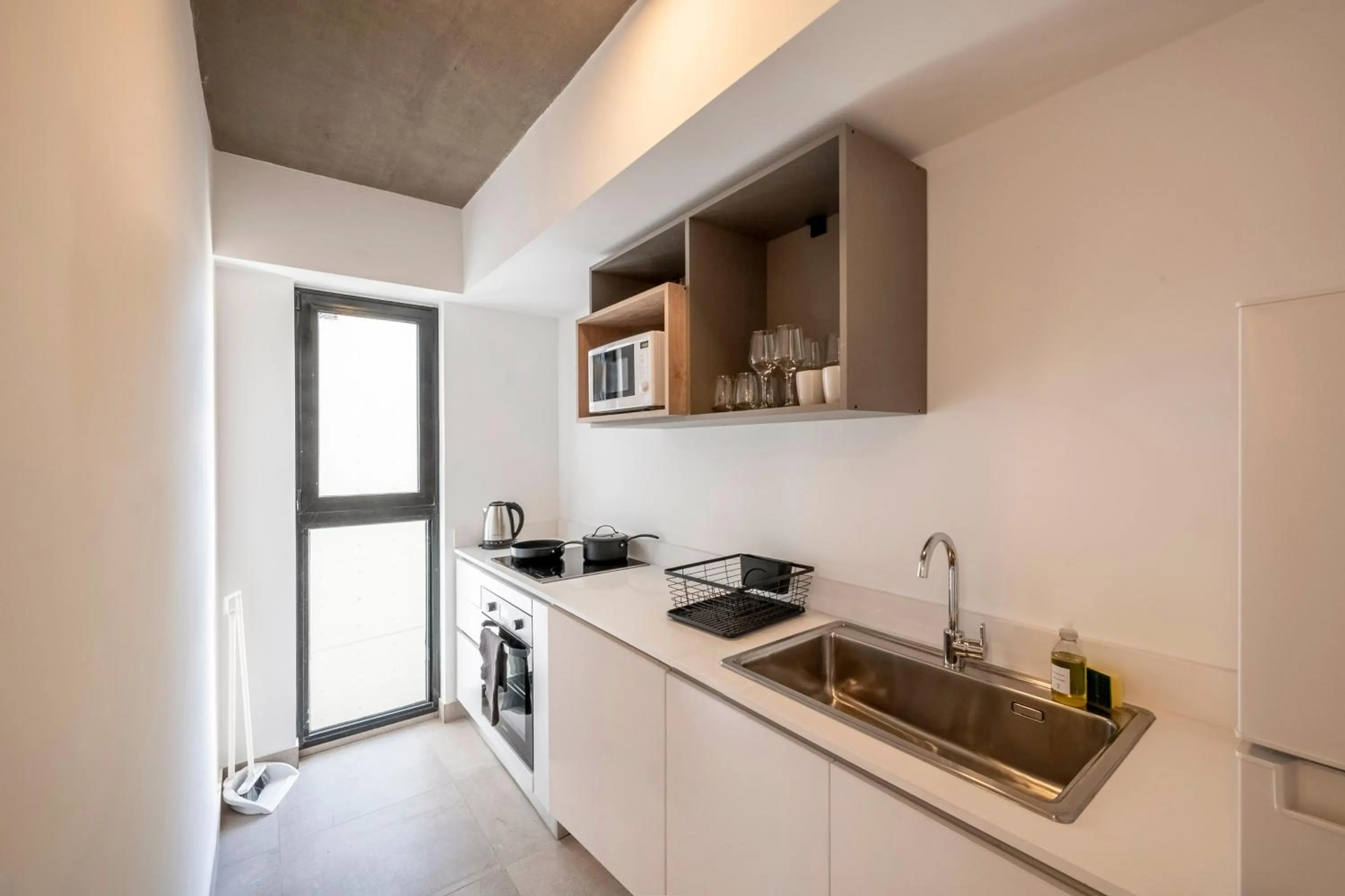 Kitchen or kitchenette in Top Rentals Nuñez