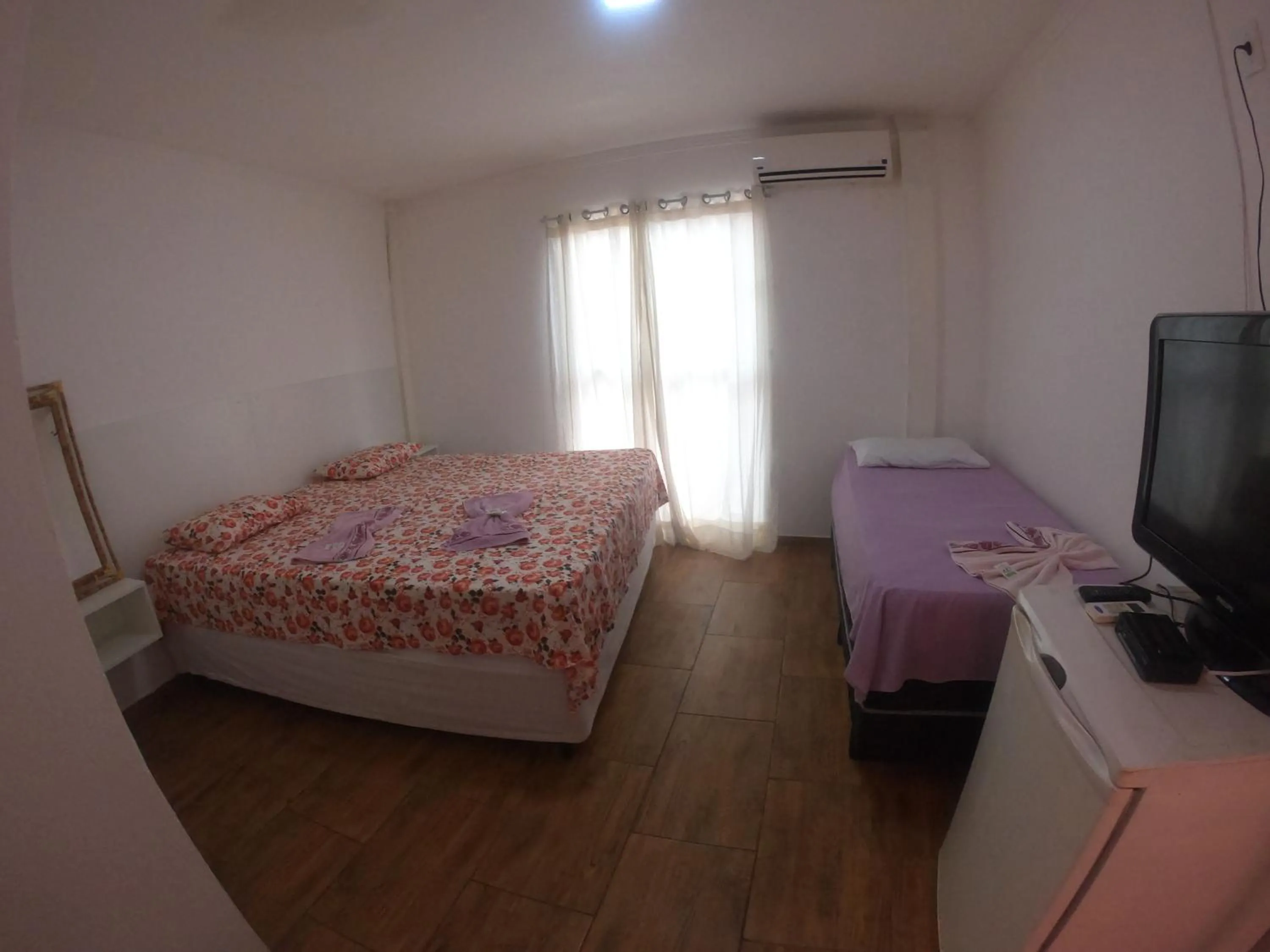 Bed in Pousada Villa DelleRose