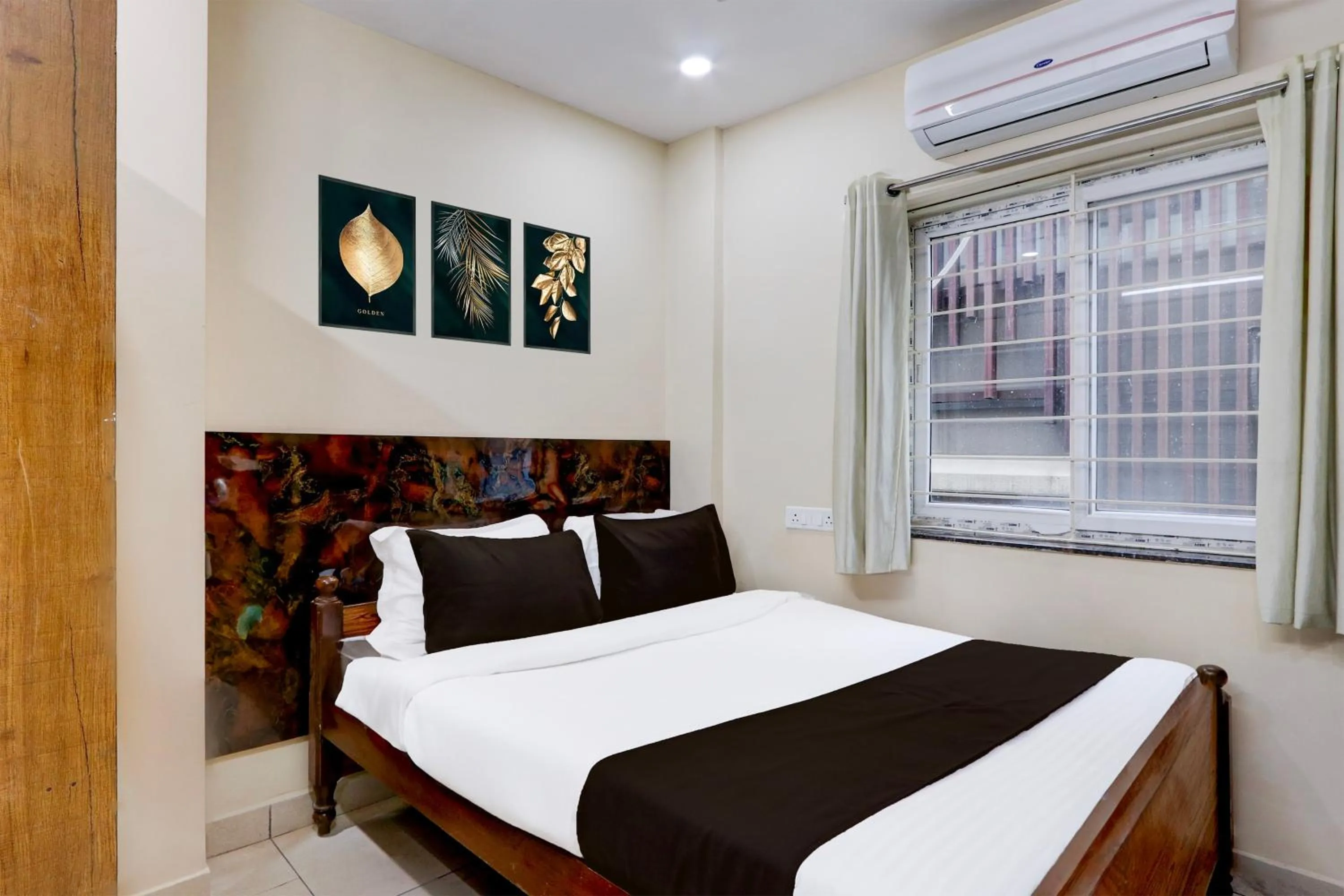 Bedroom, Bed in Hotel O Sai Manikanta Homes