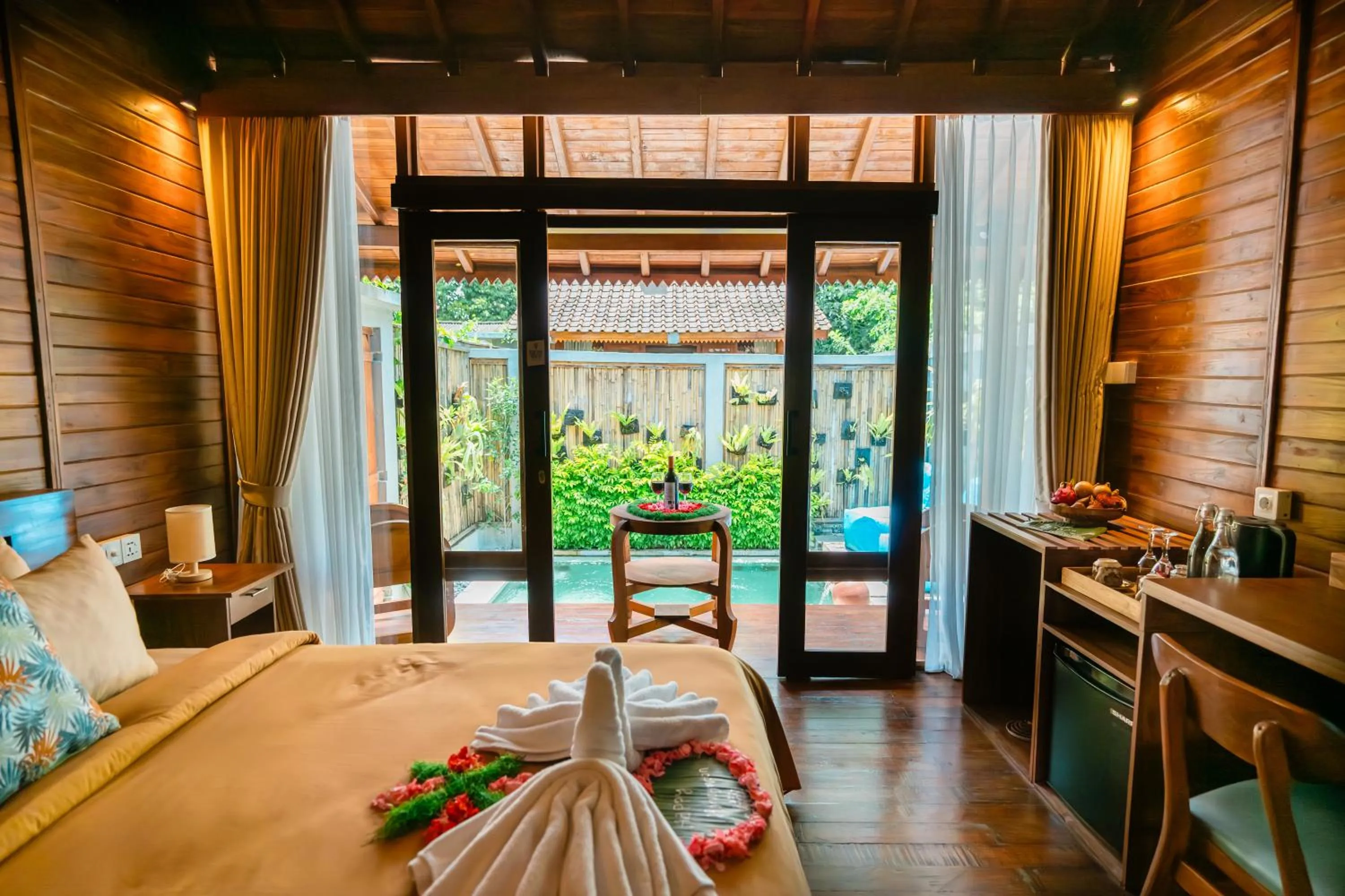 Pool view, Bed in Ngesil Private Joglo & Pool