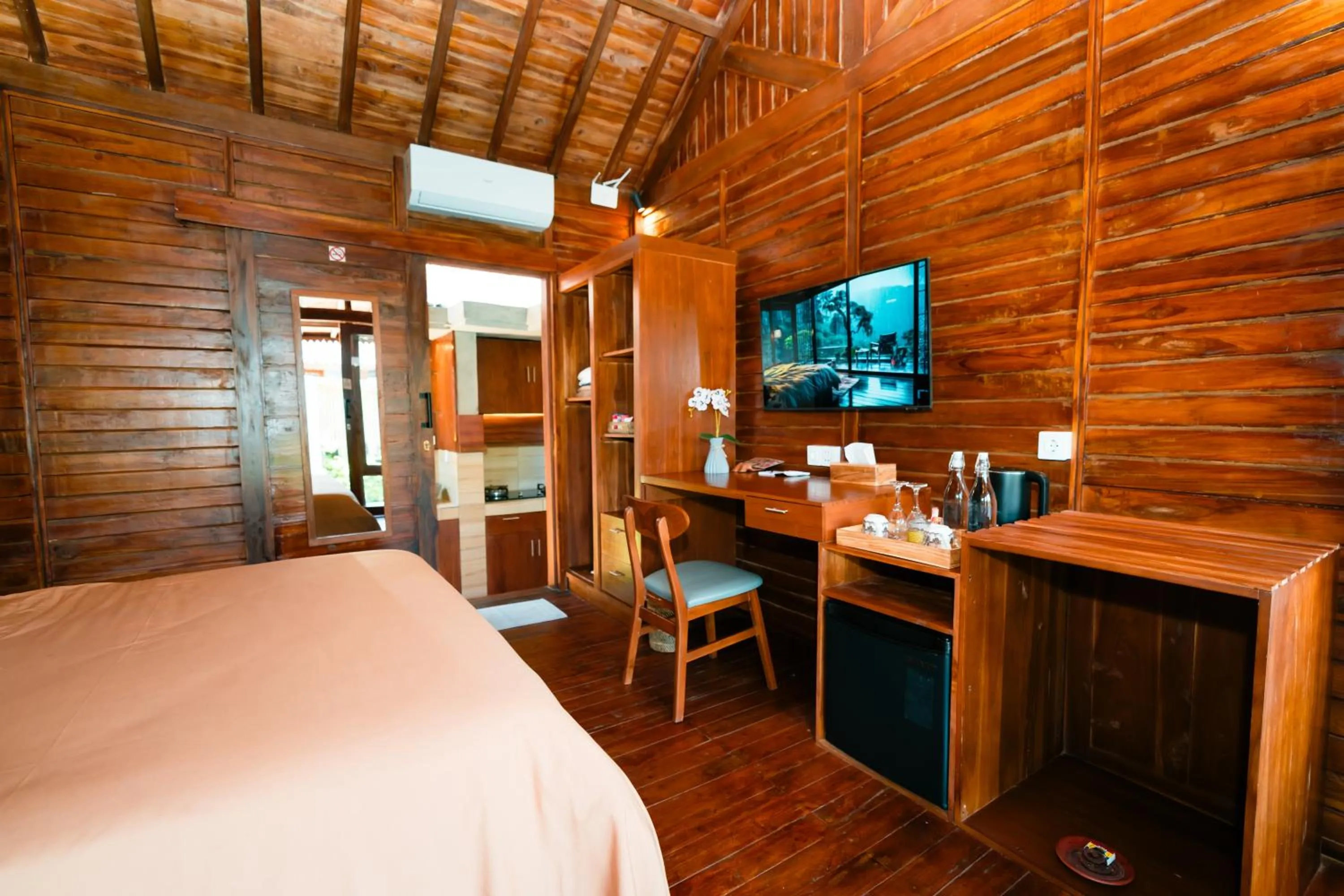 TV and multimedia, Bed in Ngesil Private Joglo & Pool