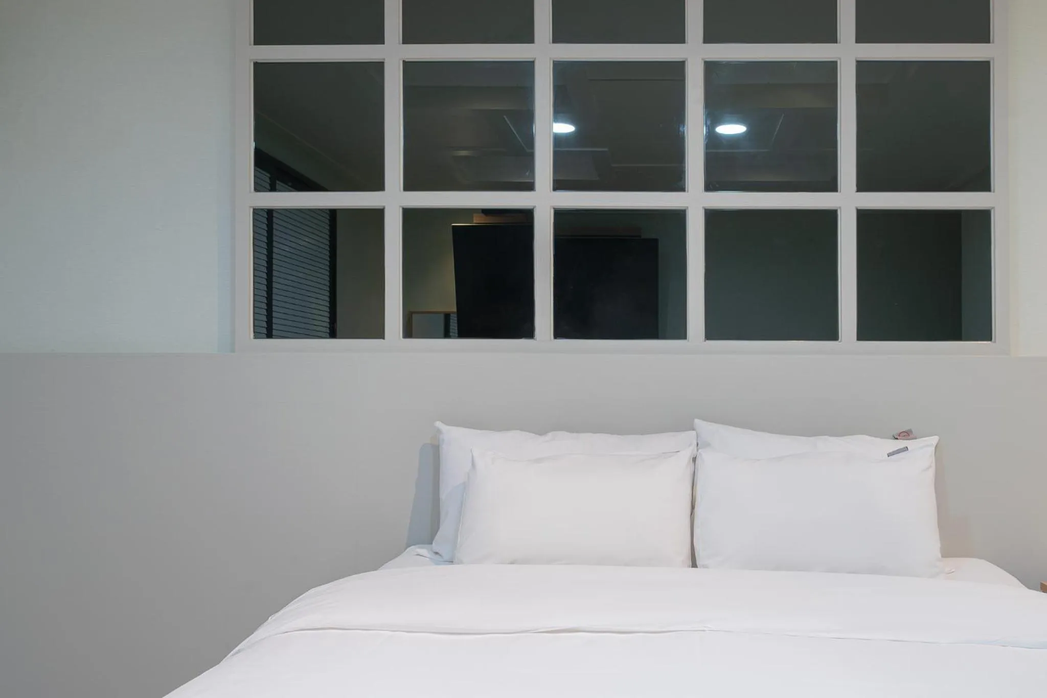 Bed in Curve Hotel Iksan