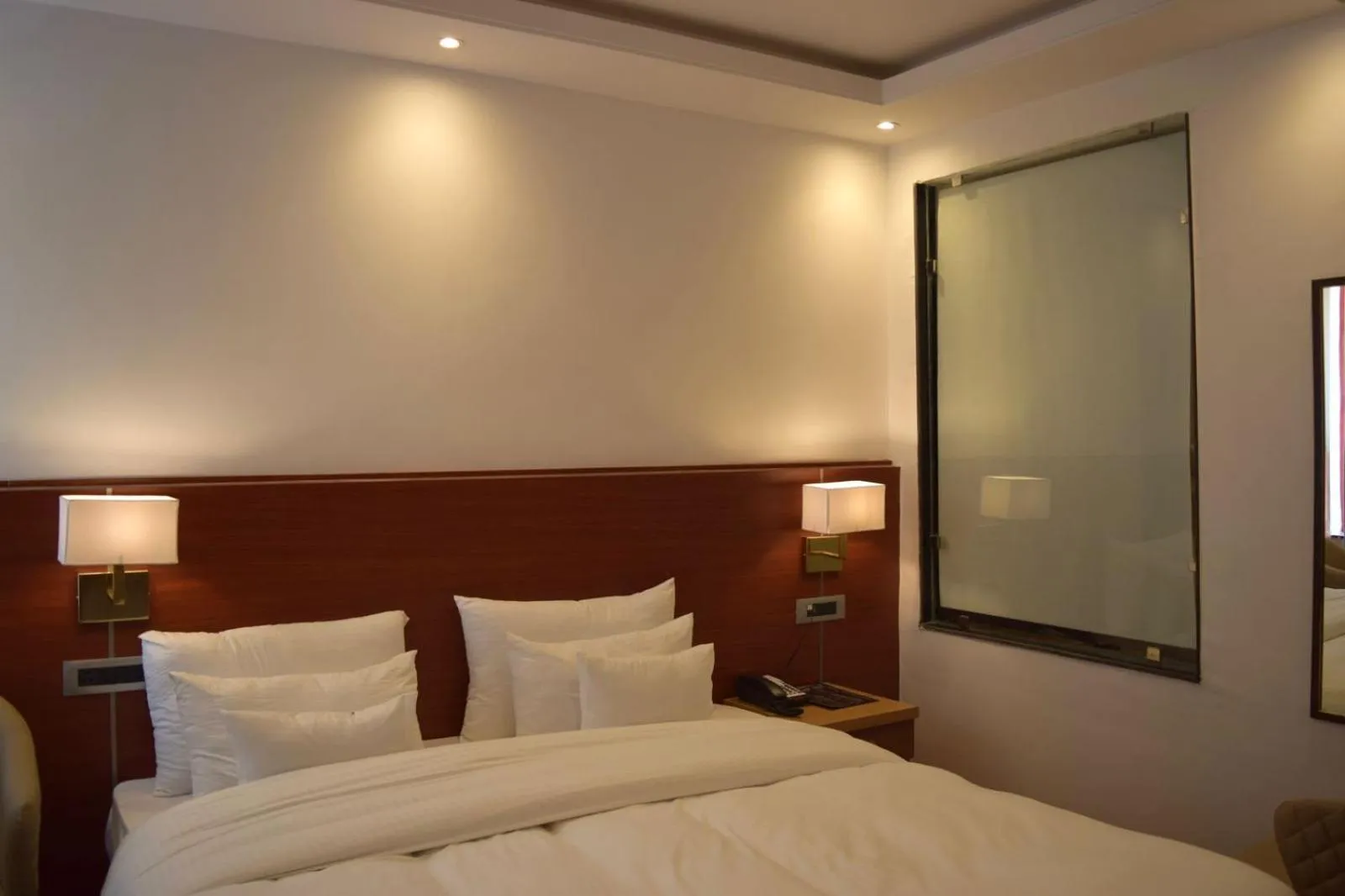 Bed in Hotel The Haven - Centrally Heated and Air Conditioned