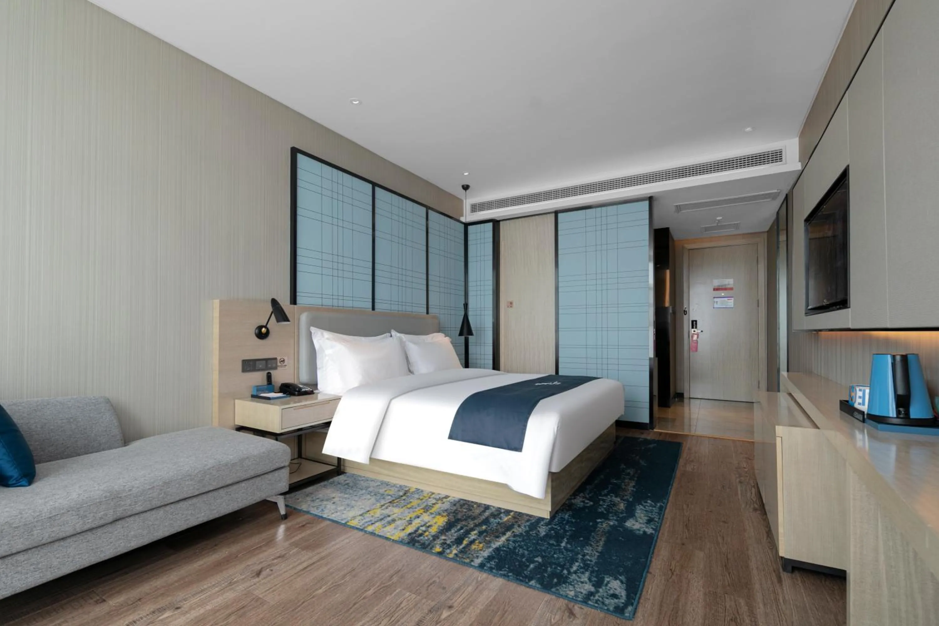 Photo of the whole room, Bed in Eharm Hotel Jingzhou Olympic Sports Center
