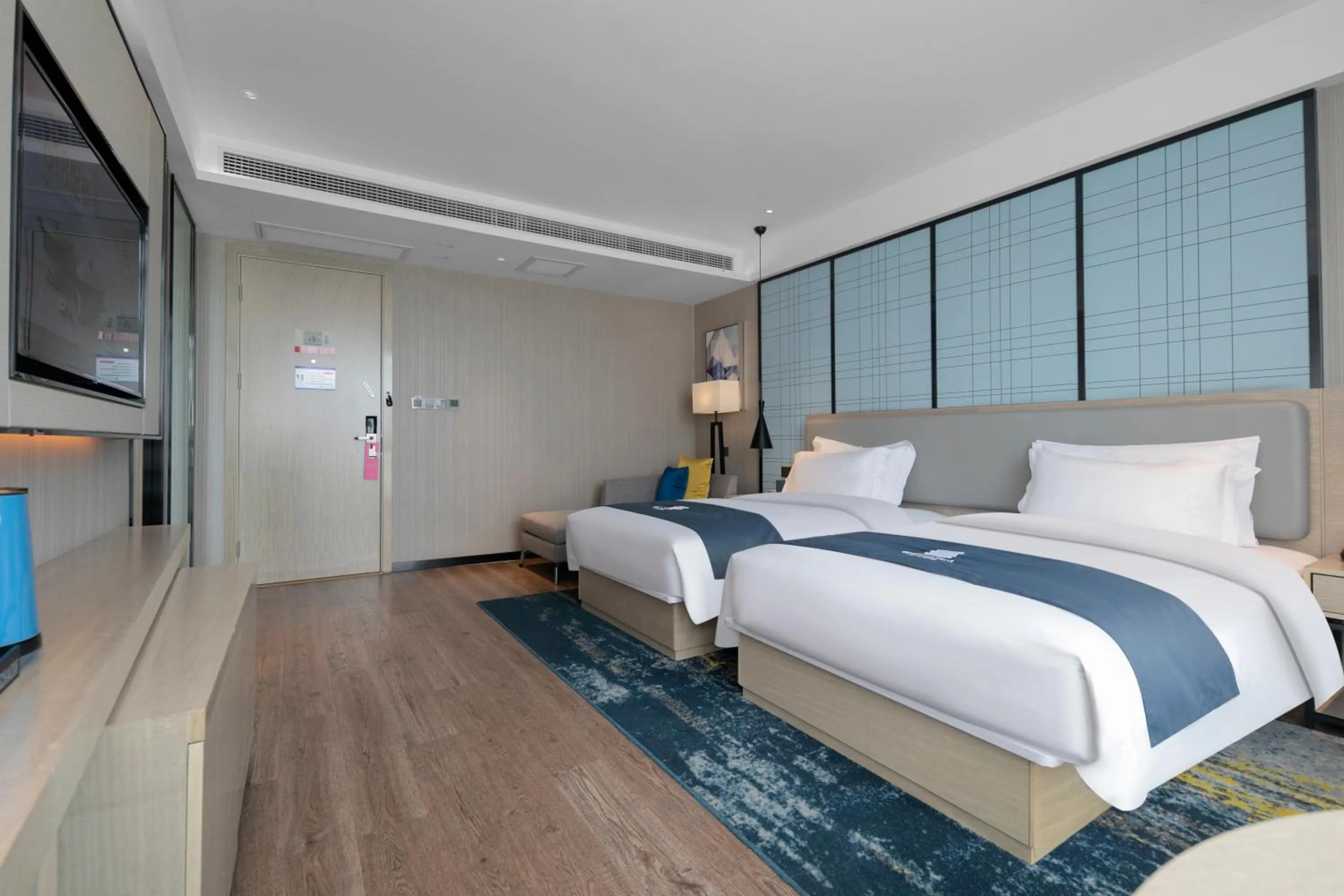 Photo of the whole room, Bed in Eharm Hotel Jingzhou Olympic Sports Center