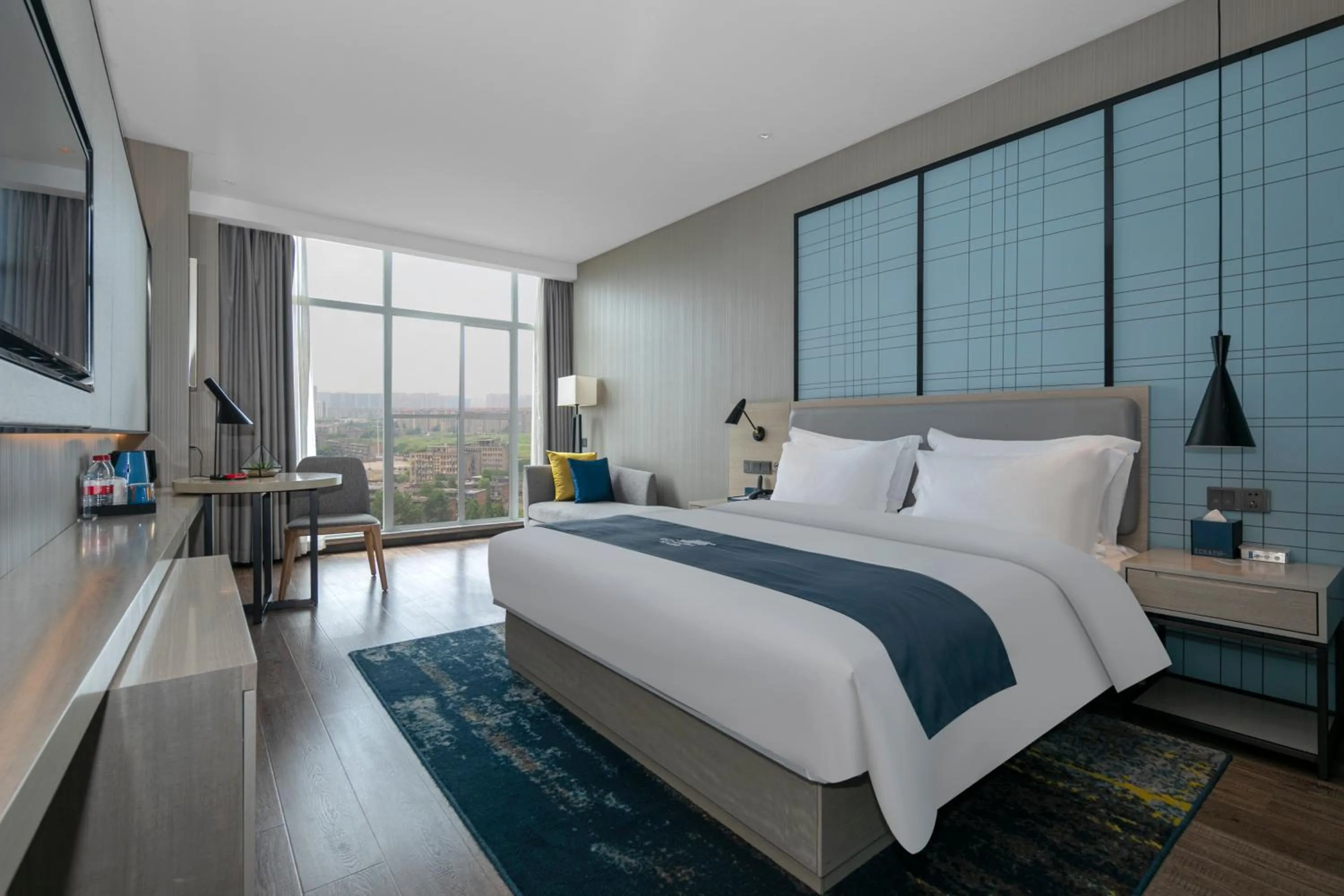 Photo of the whole room, Bed in Eharm Hotel Jingzhou Olympic Sports Center