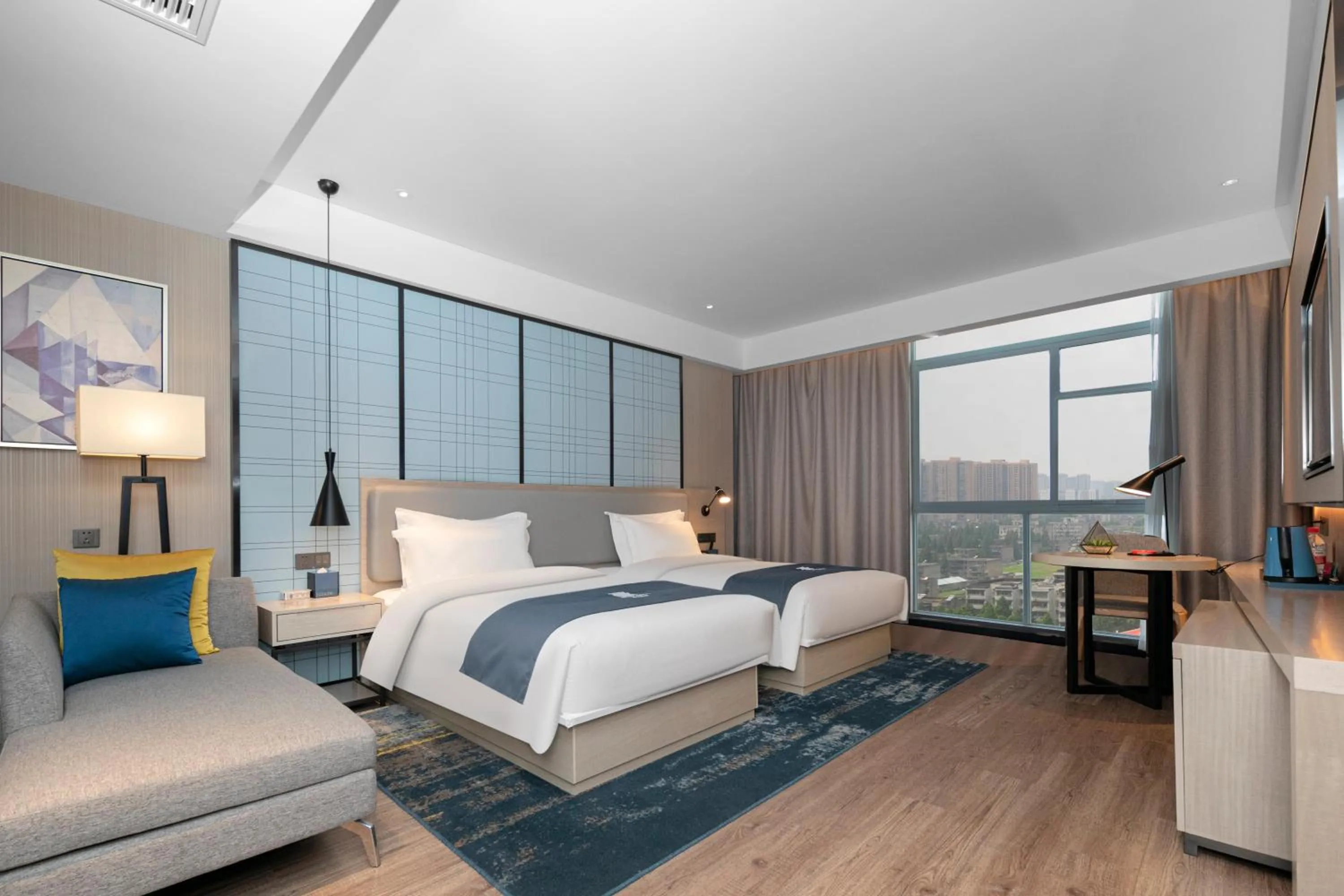 Photo of the whole room, Bed in Eharm Hotel Jingzhou Olympic Sports Center