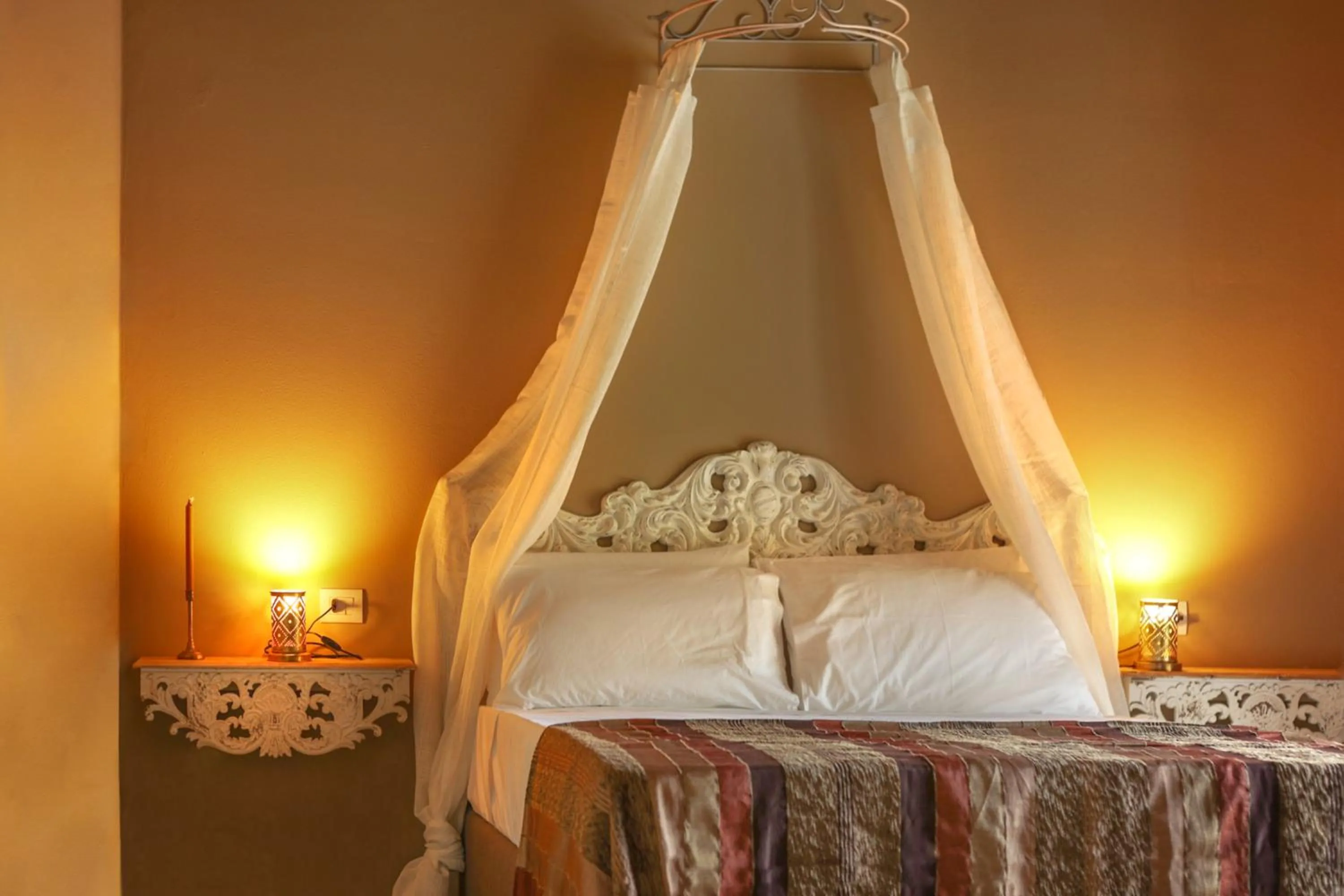 Bed in Luce Boutique Hotel