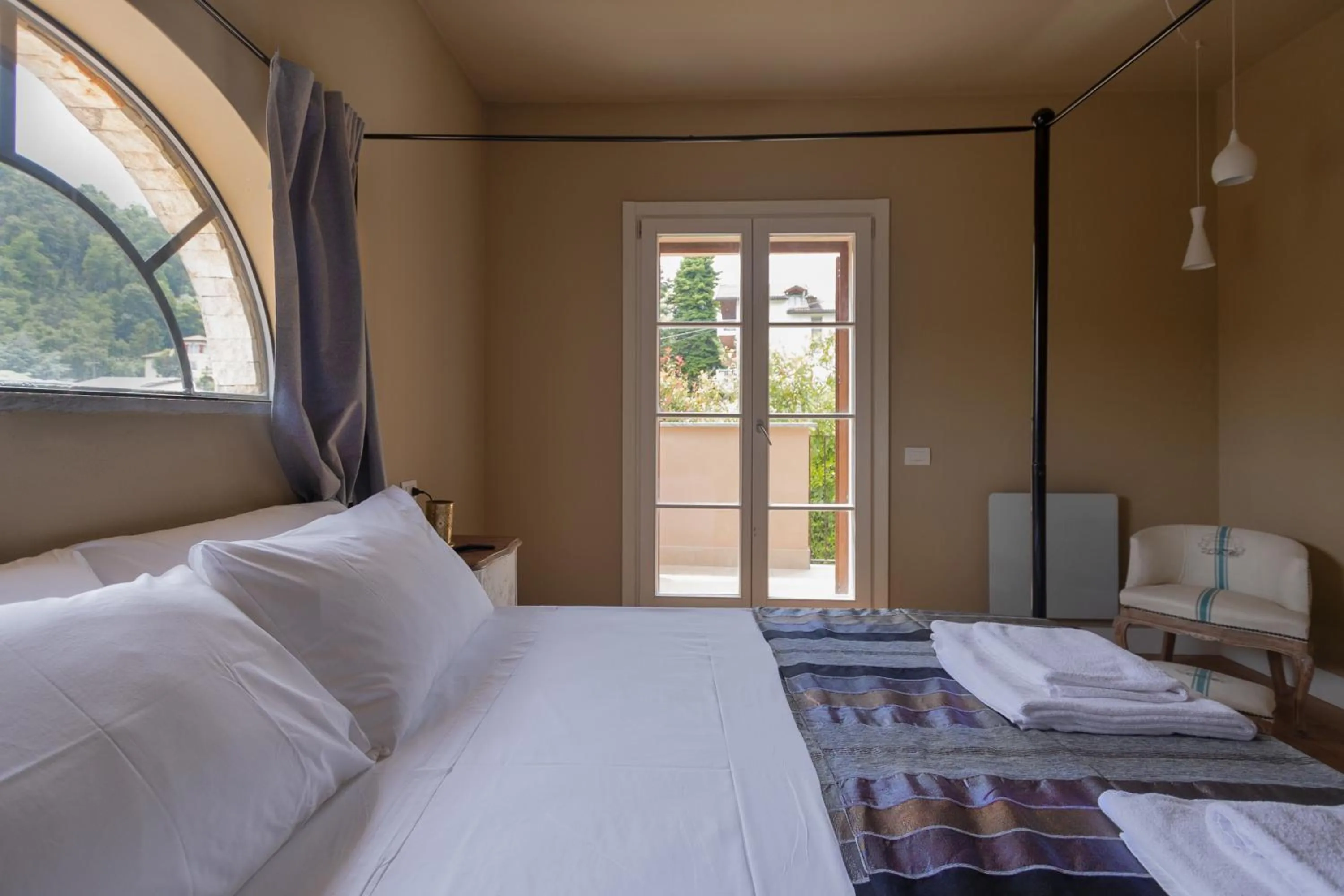 Bed in Luce Boutique Hotel