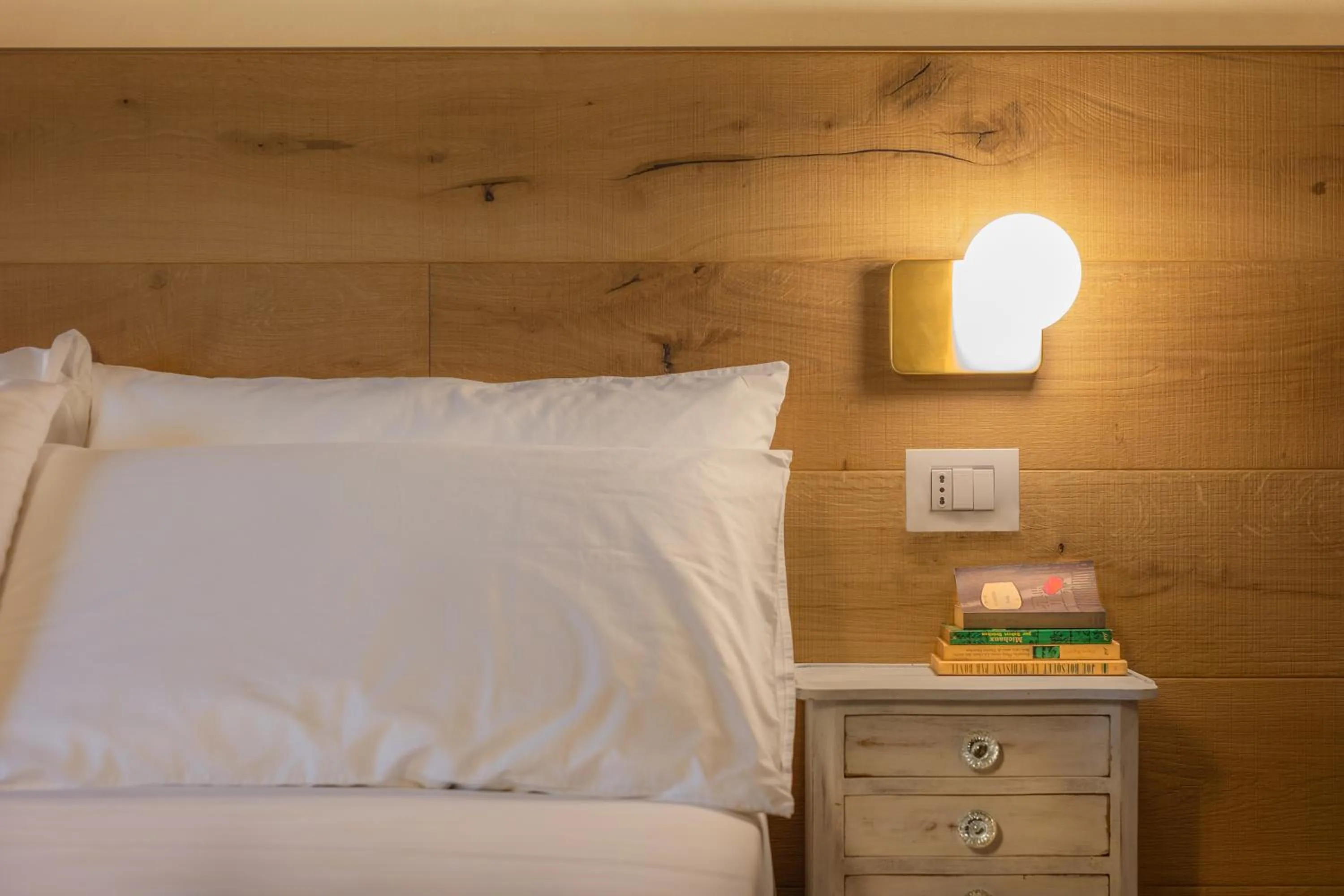 Bed in Luce Boutique Hotel