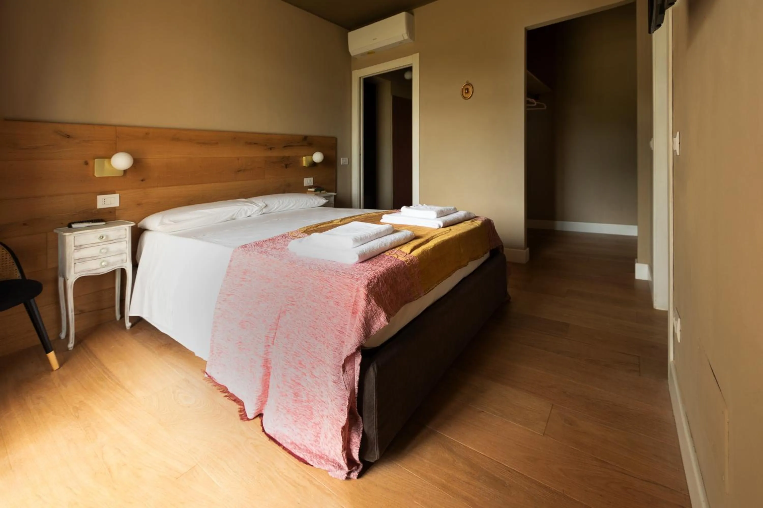 Bed in Luce Boutique Hotel