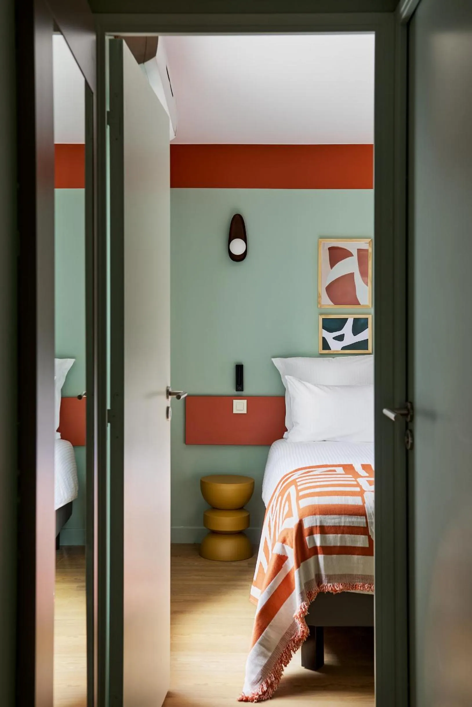 Bed in Hôtel Ligo by HappyCulture