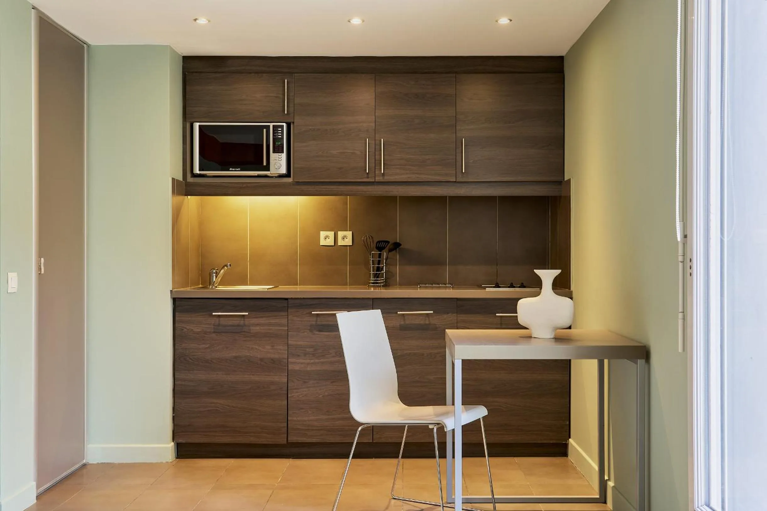 kitchen in Hôtel Ligo by HappyCulture