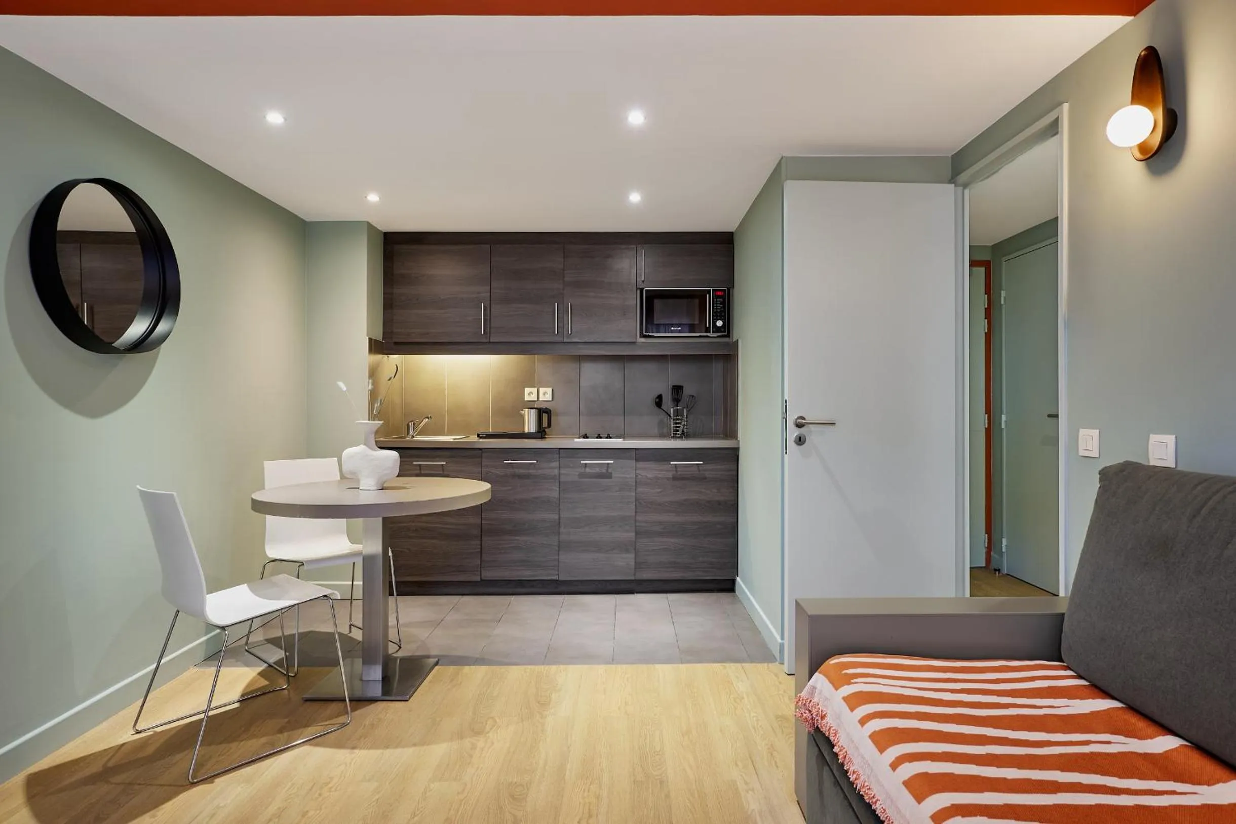 Kitchen or kitchenette in Hôtel Ligo by HappyCulture