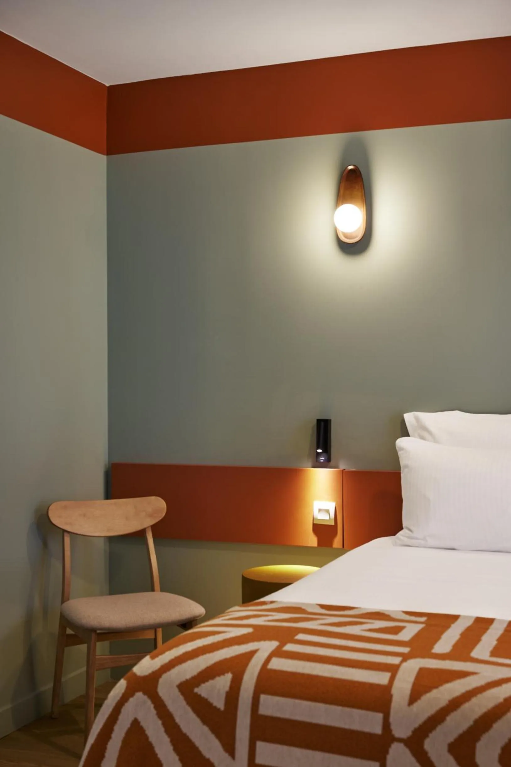 Bed in Hôtel Ligo by HappyCulture