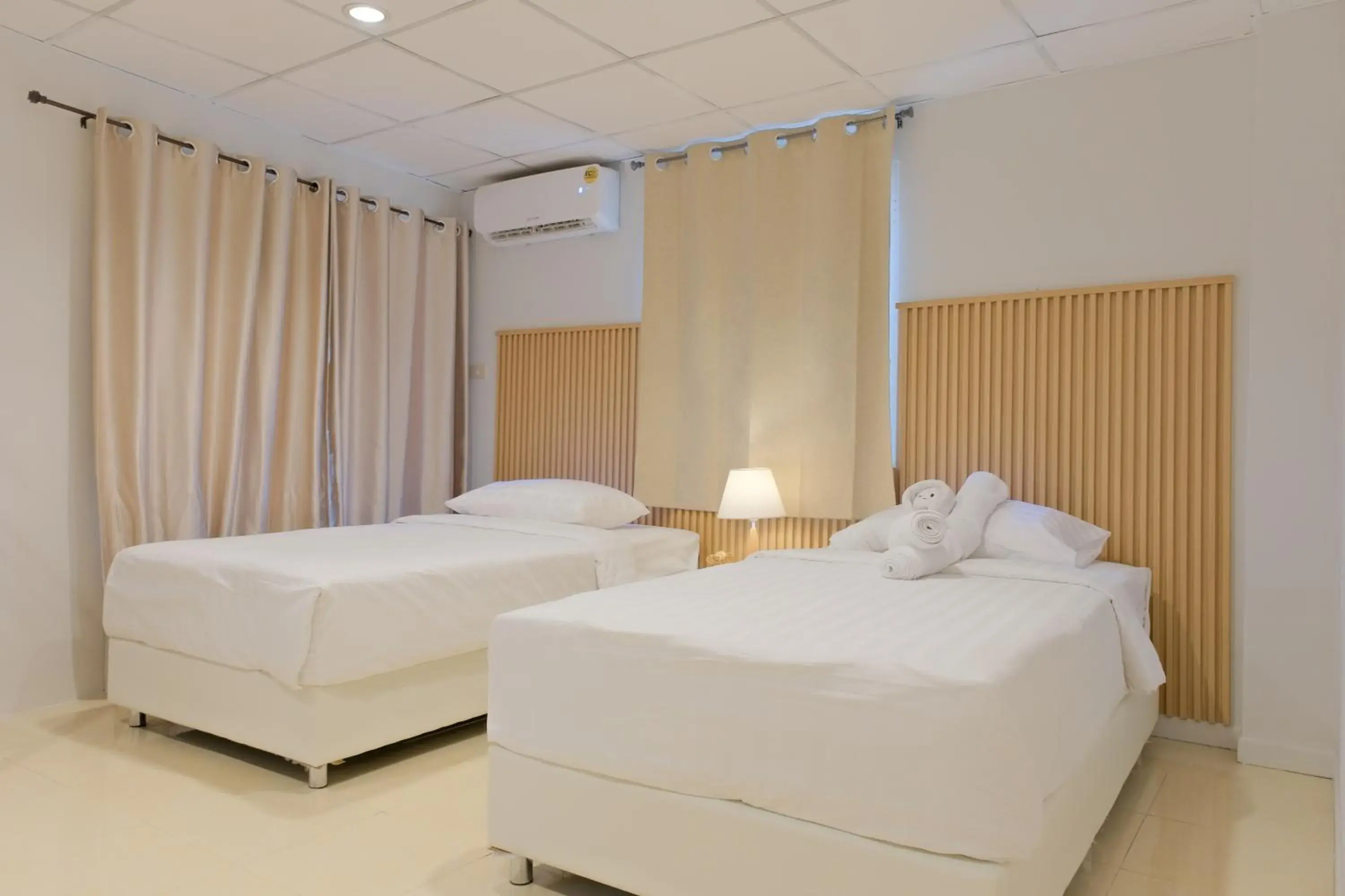 Twin Room with Balcony in Baan Chinnakarn Twin Room with Balcony in Baan Chinnakarn