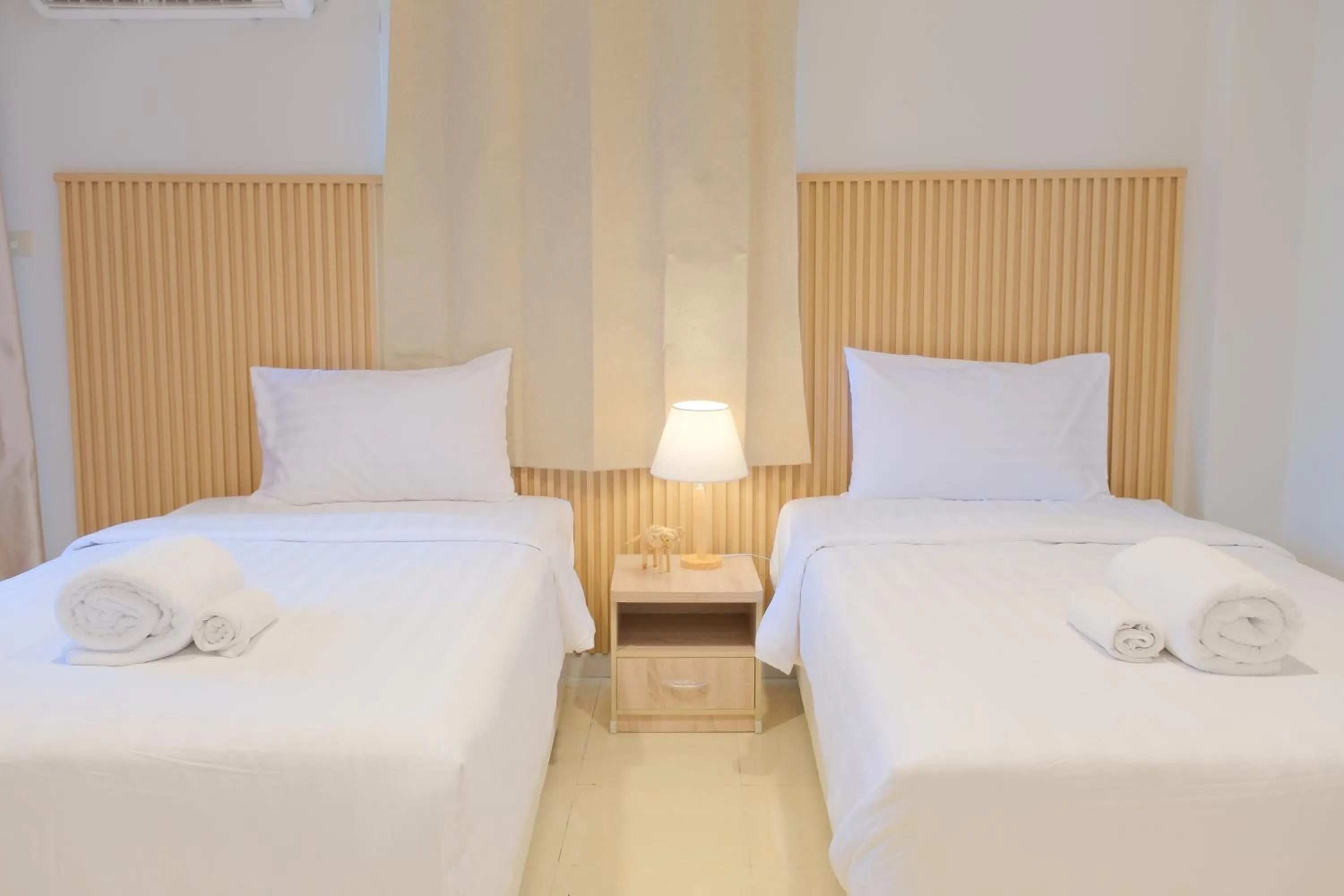 Bed in Baan Chinnakarn