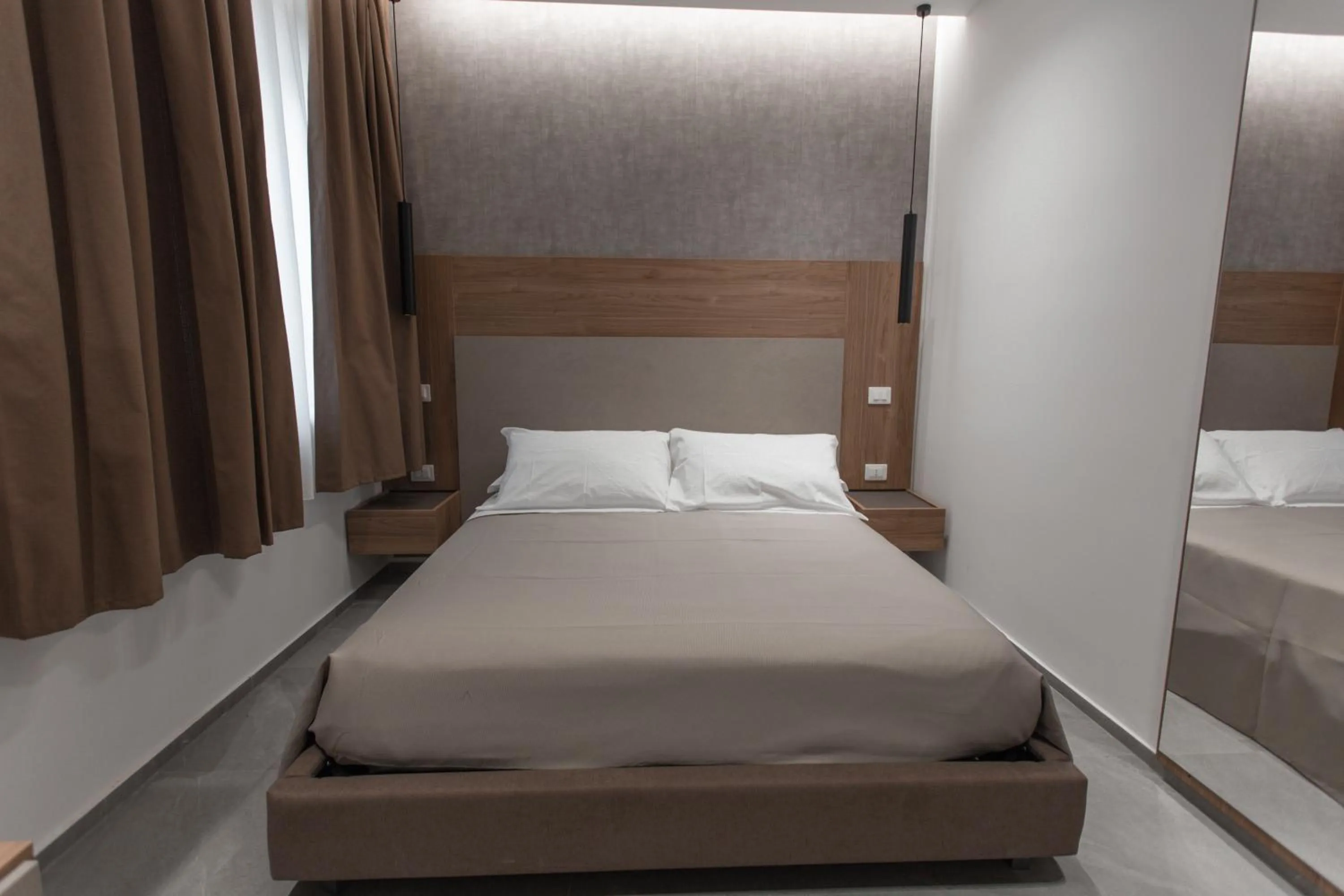 Bed in Alexander House Hotel