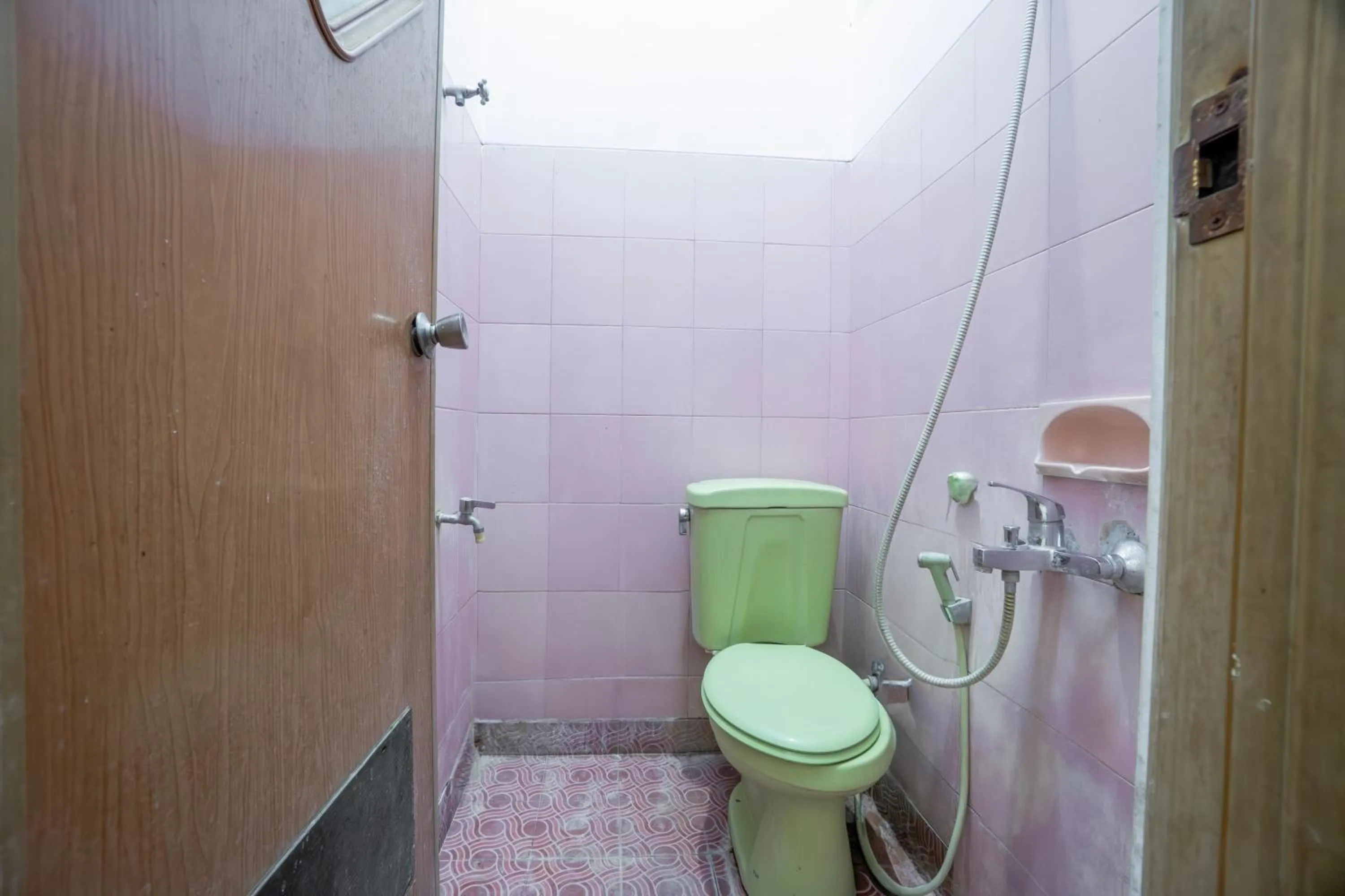 Bedroom in Hotel O Central Madiun Near Stasiun Kota Madiun