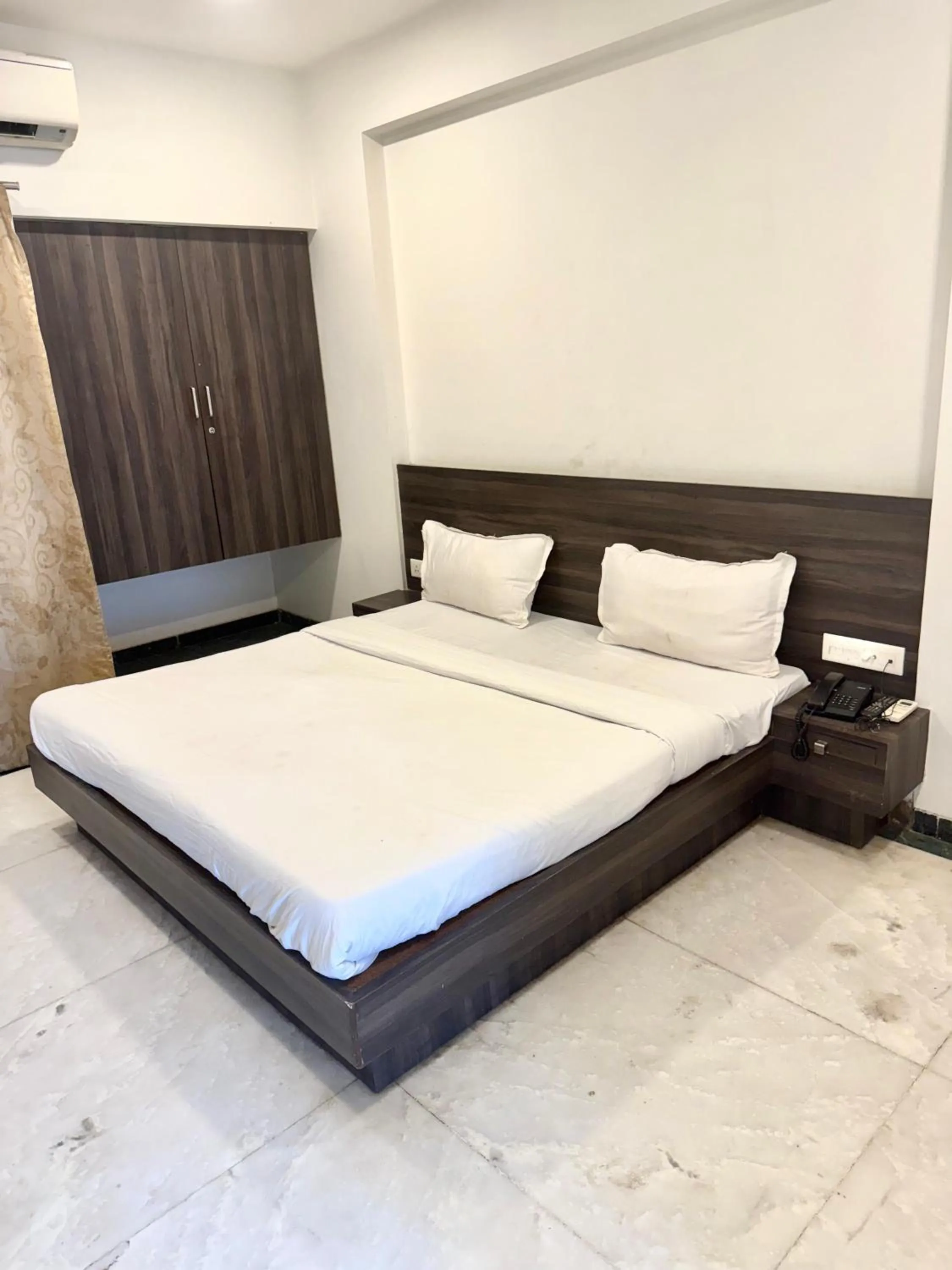 Bed in The Byke Suresh Plaza