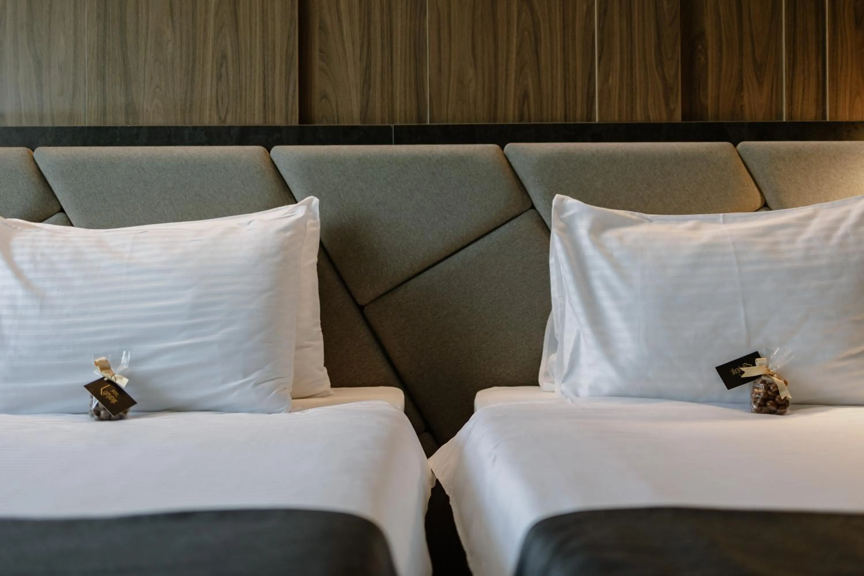 View (from property/room), Bed in Lumière Hotel Pool & SPA