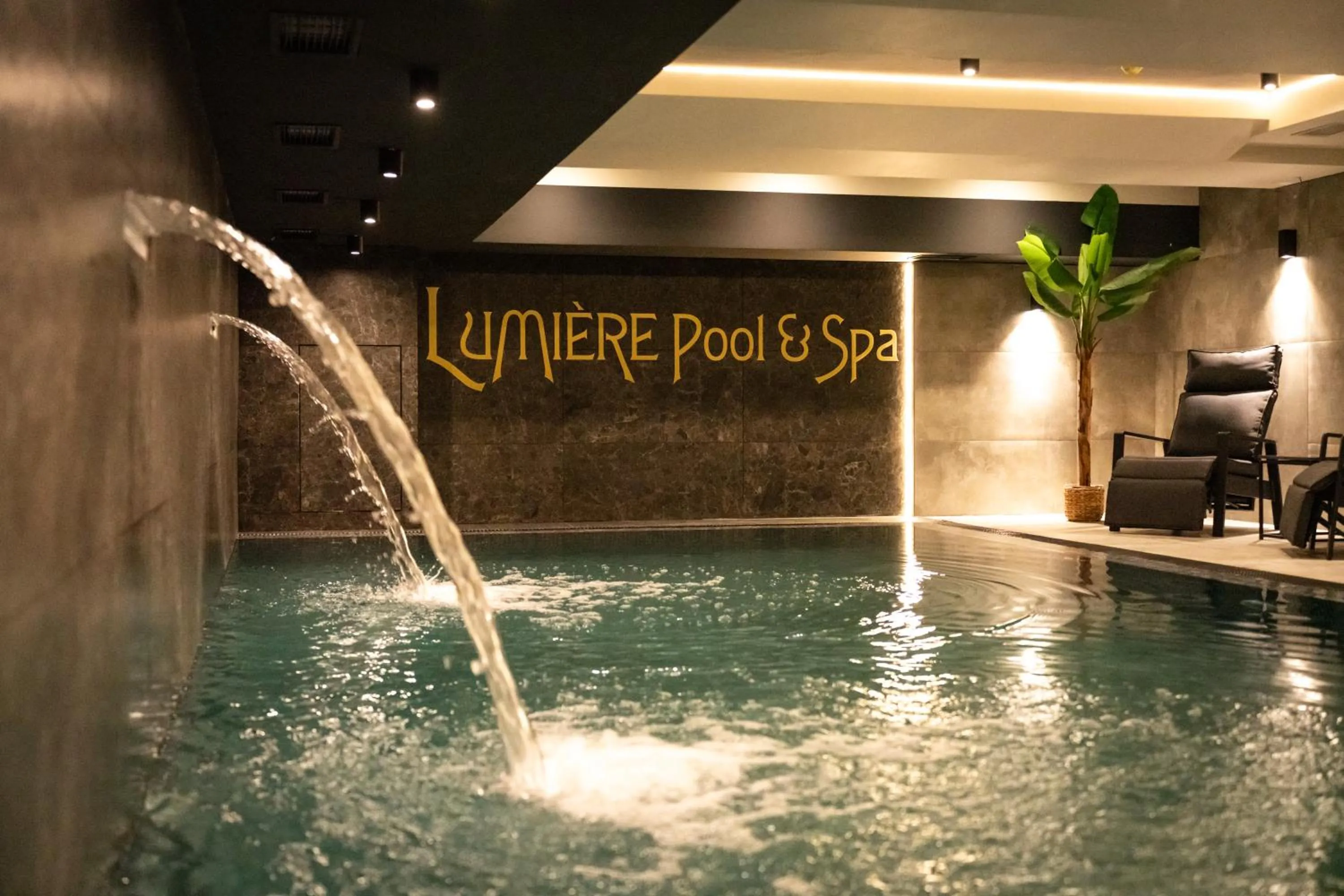Text overlay in Lumière Hotel Pool & SPA