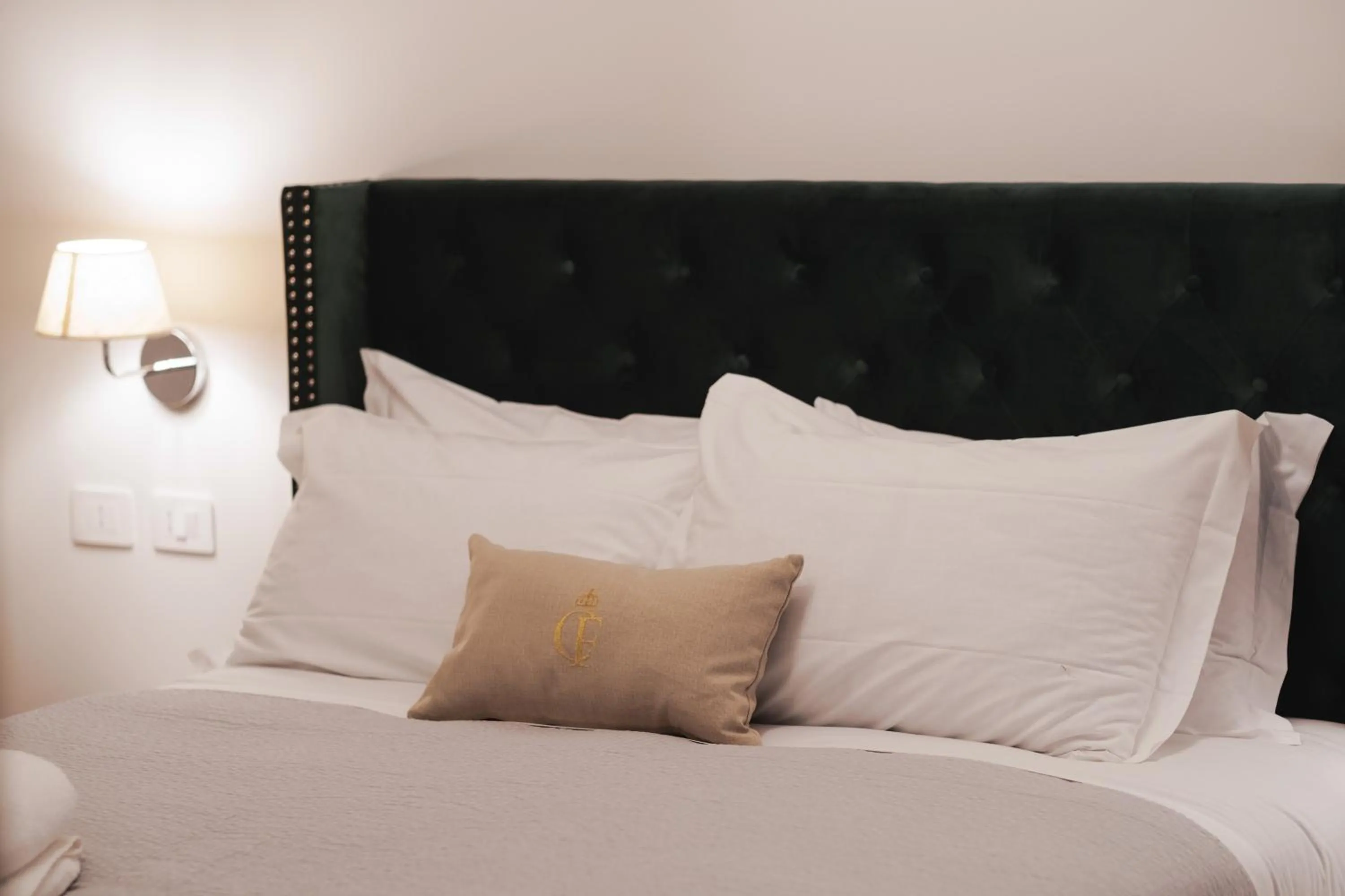 Bed in Carlo Felice Boutique Hotel