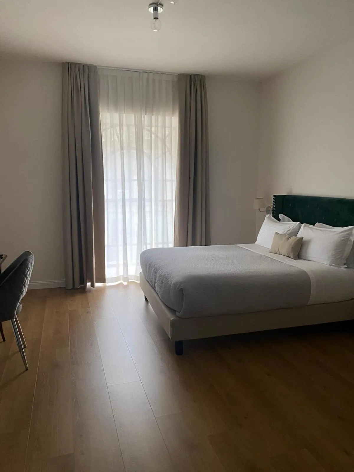 Bed in Carlo Felice Boutique Hotel