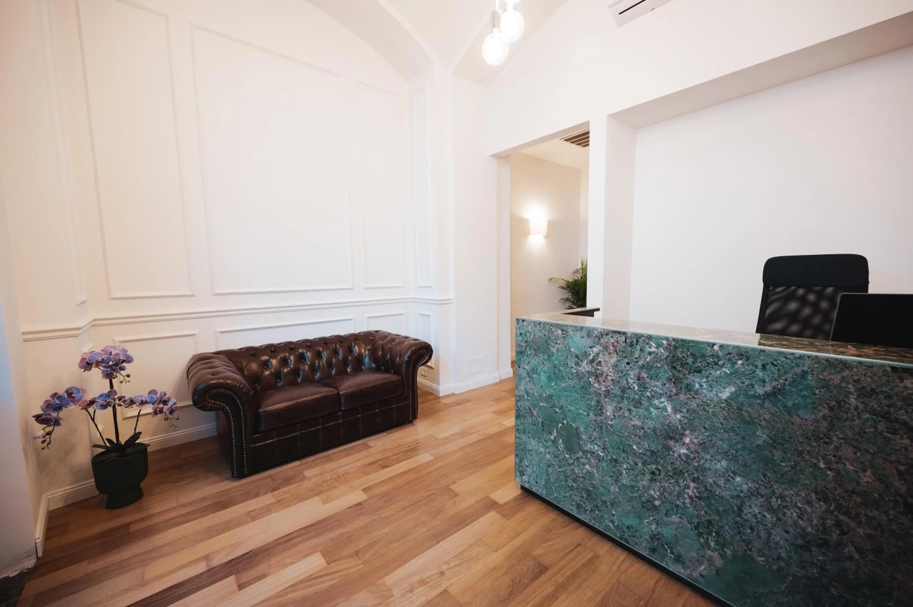 Lobby or reception in Carlo Felice Boutique Hotel