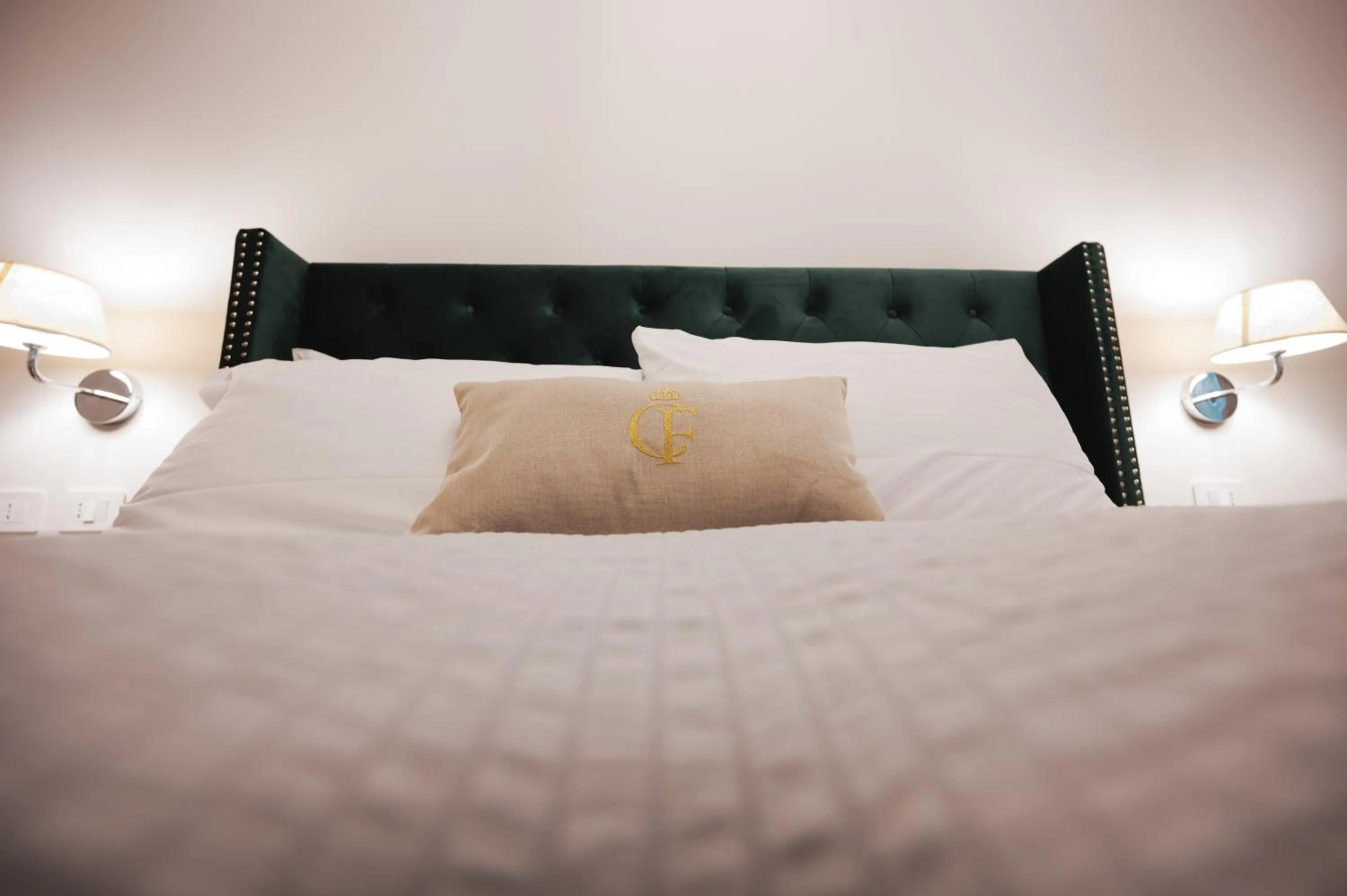 Bed in Carlo Felice Boutique Hotel