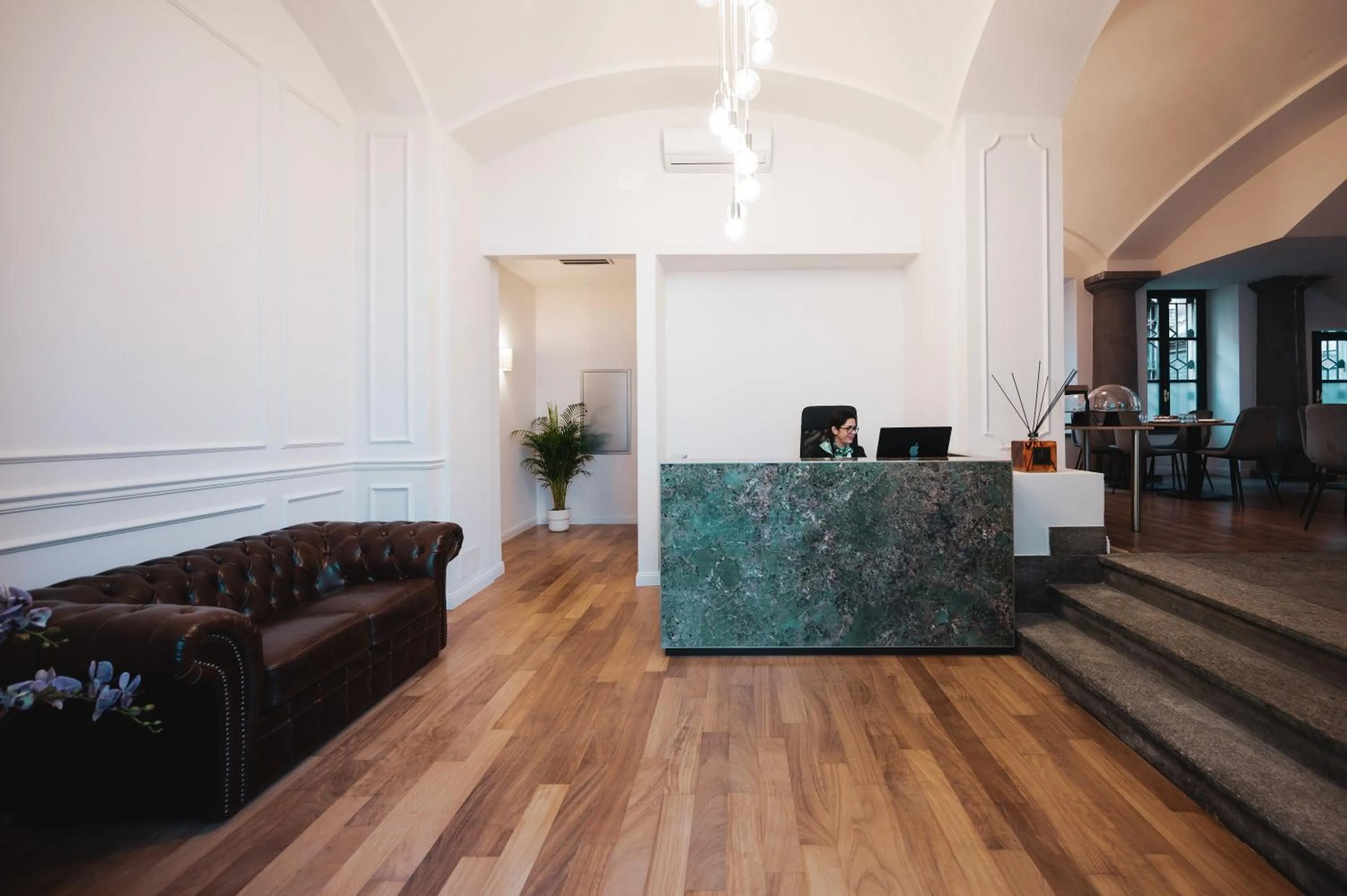 Lobby or reception in Carlo Felice Boutique Hotel