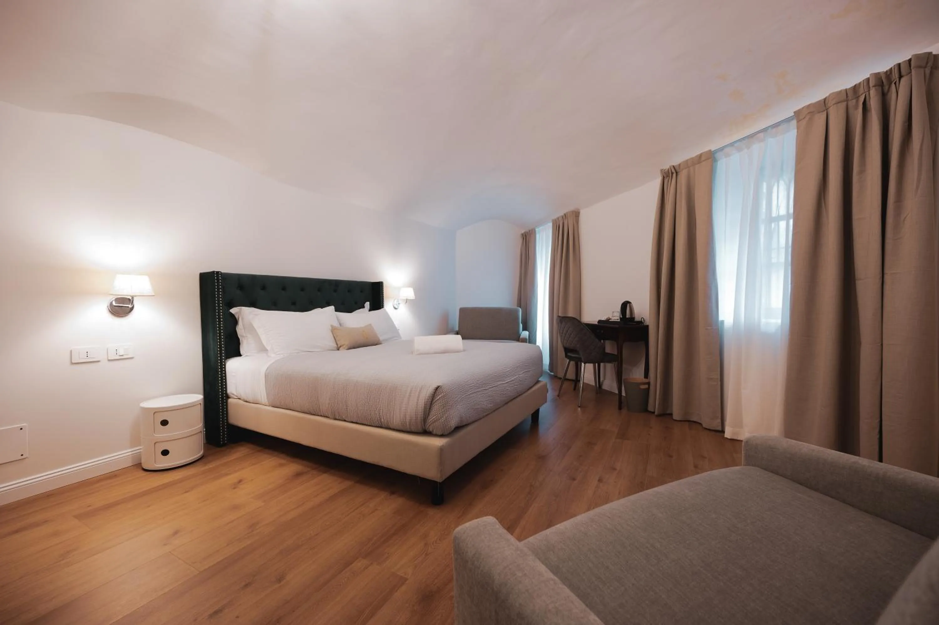 Photo of the whole room, Bed in Carlo Felice Boutique Hotel