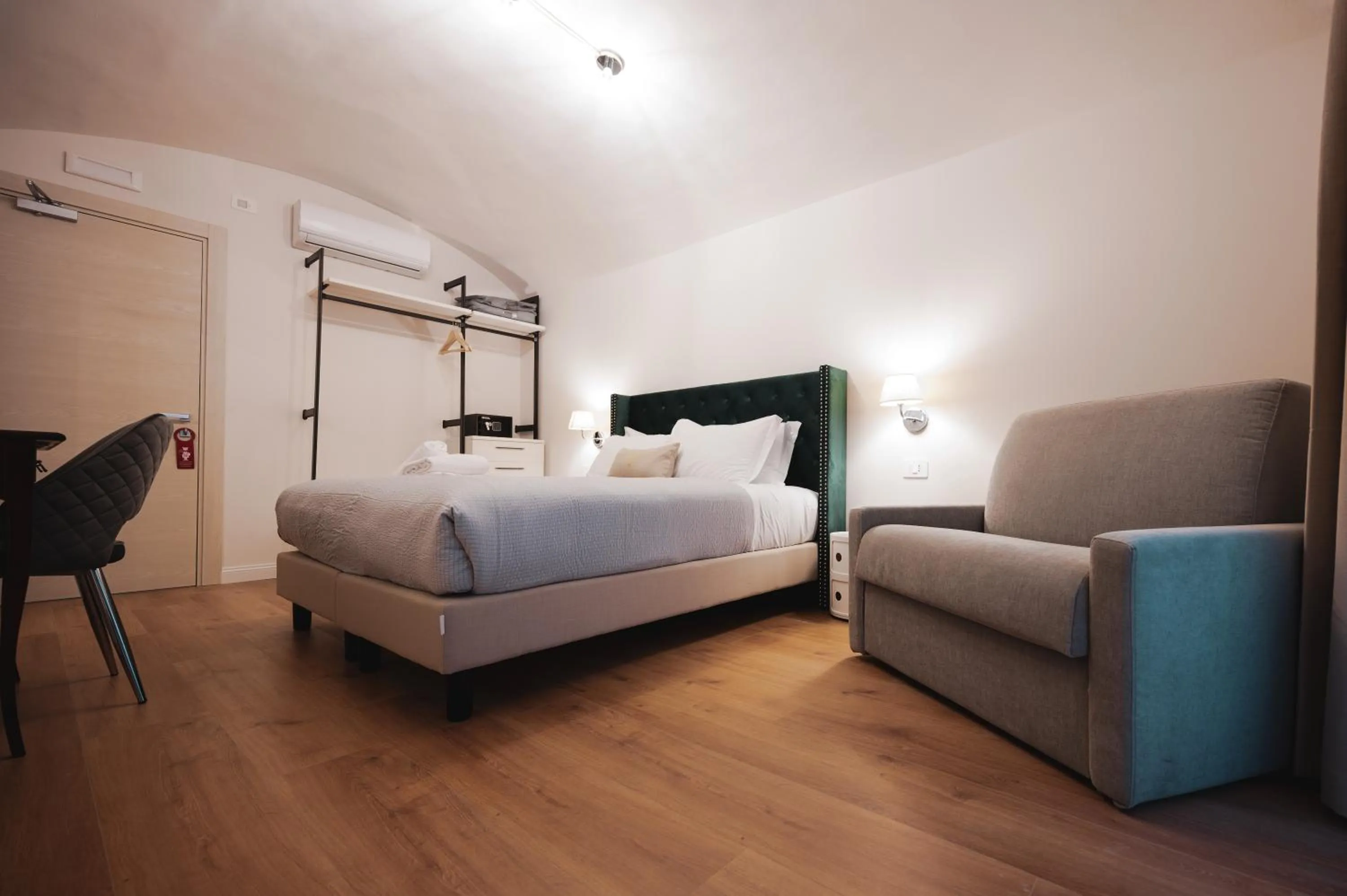 Photo of the whole room, Bed in Carlo Felice Boutique Hotel