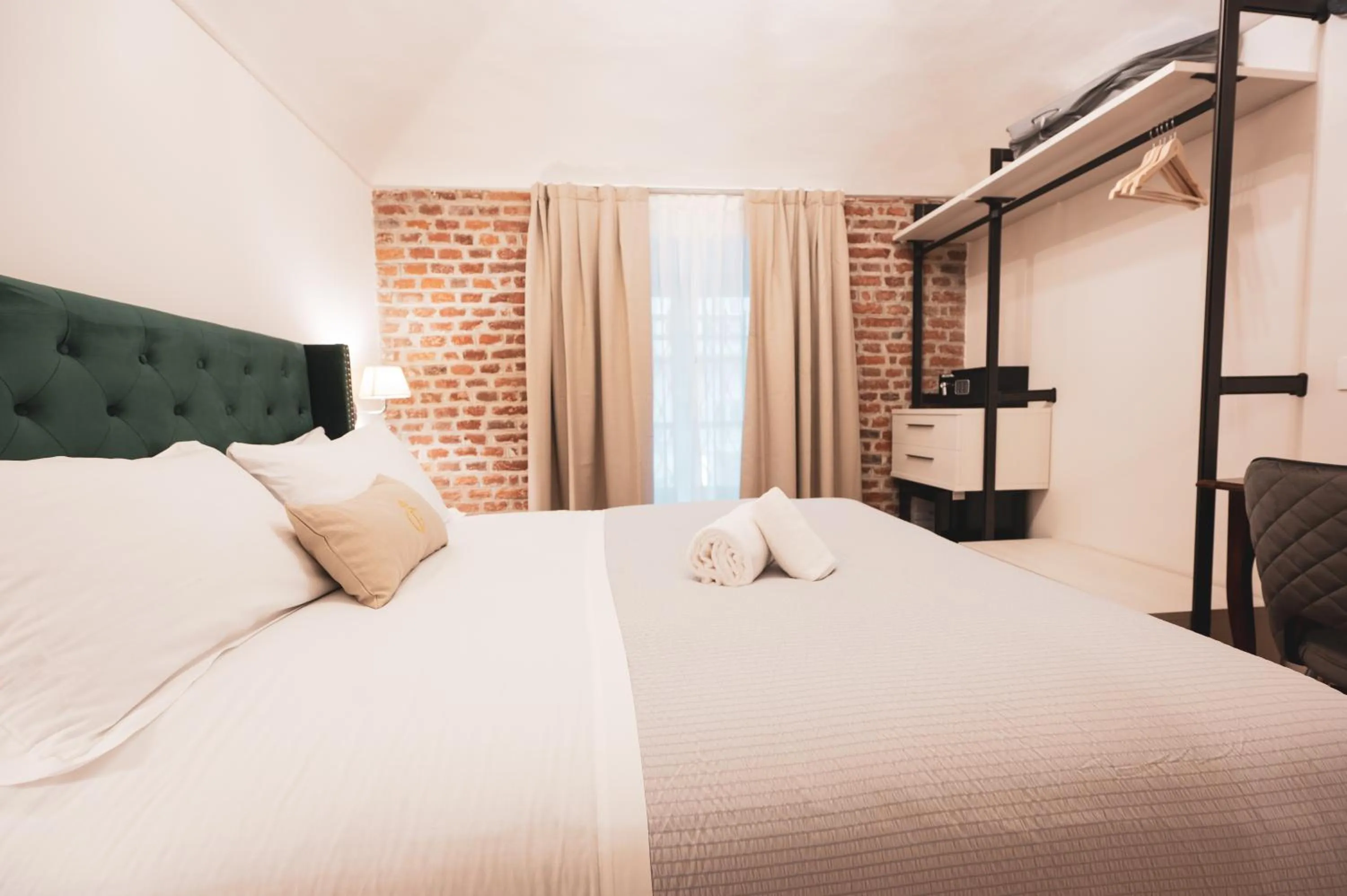 Bedroom, Bed in Carlo Felice Boutique Hotel