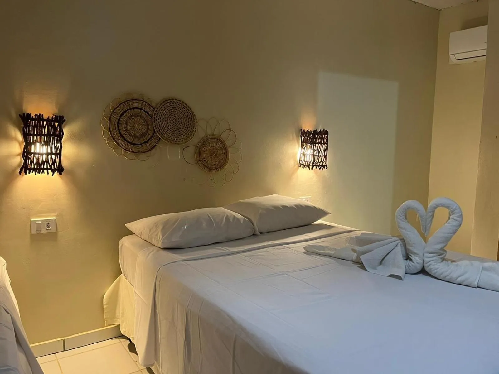 Bed in Pousada Flor de Merepe