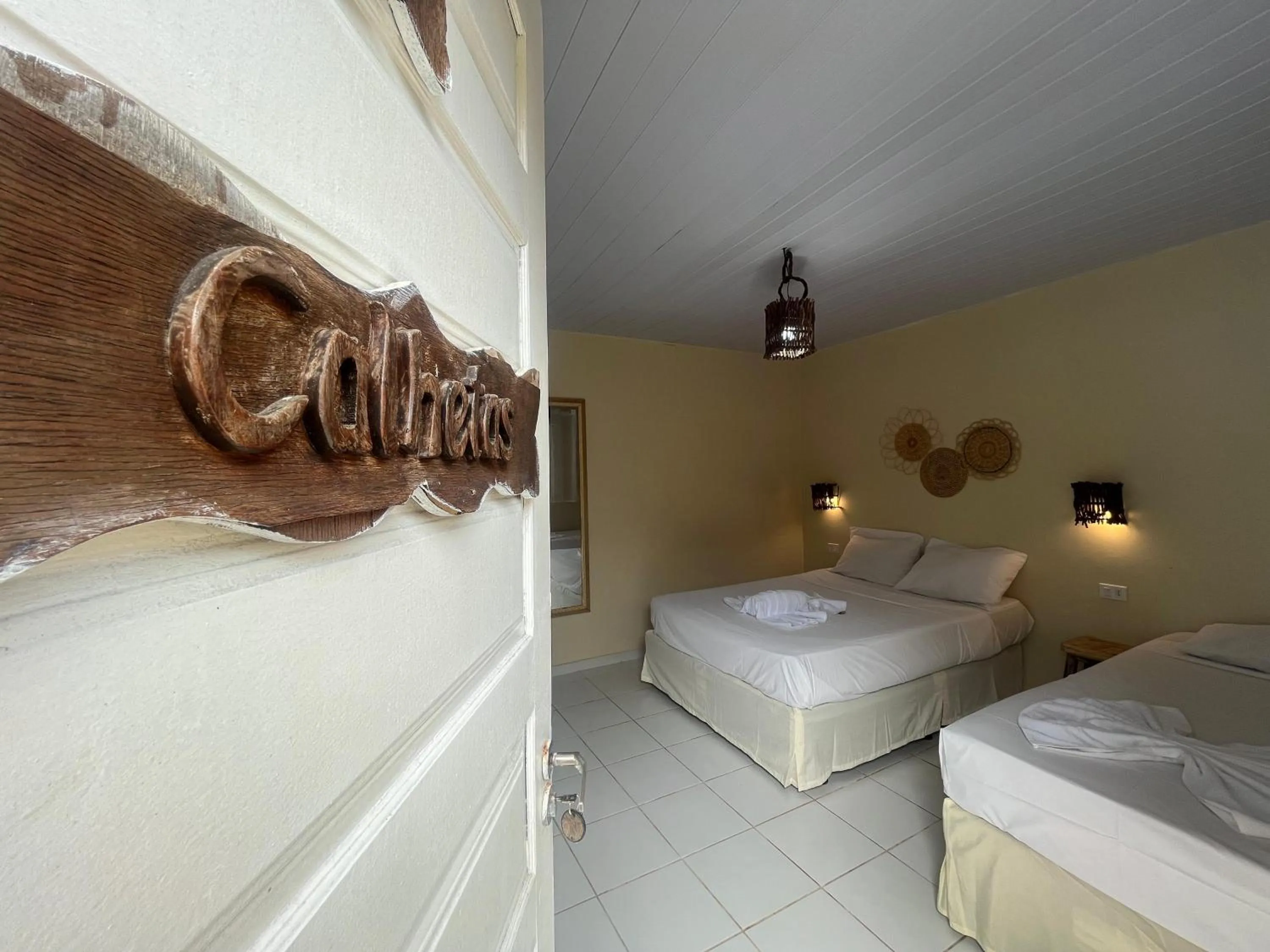 Bed in Pousada Flor de Merepe