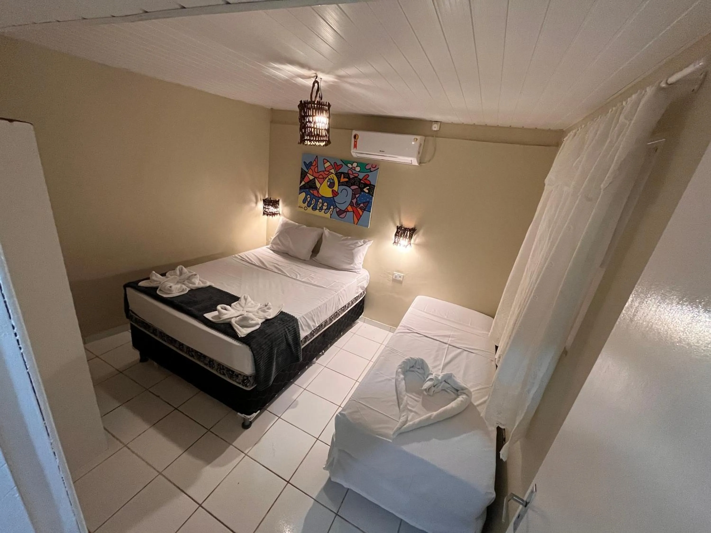 Bed in Pousada Flor de Merepe