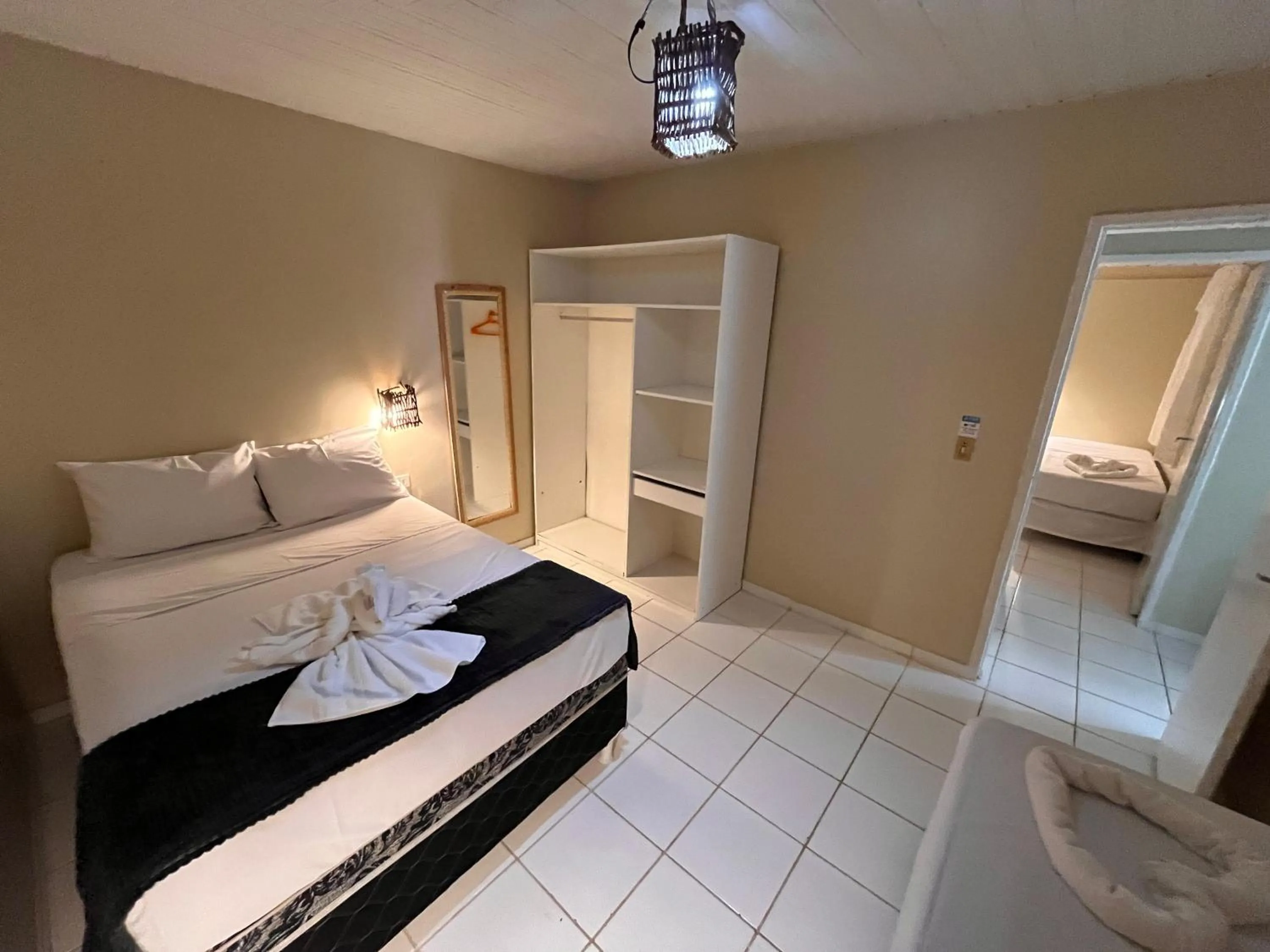 Bed in Pousada Flor de Merepe