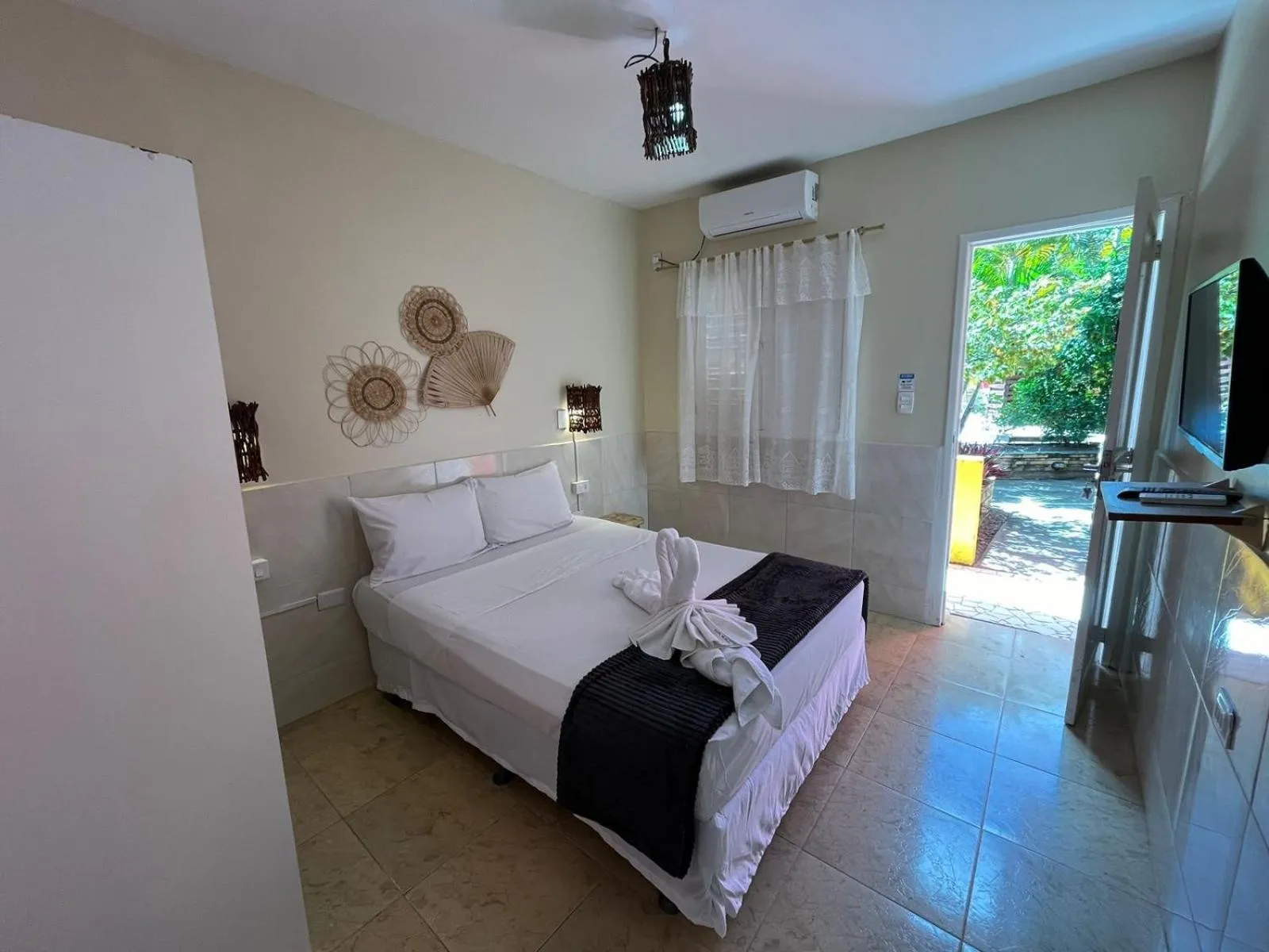 Bed in Pousada Flor de Merepe